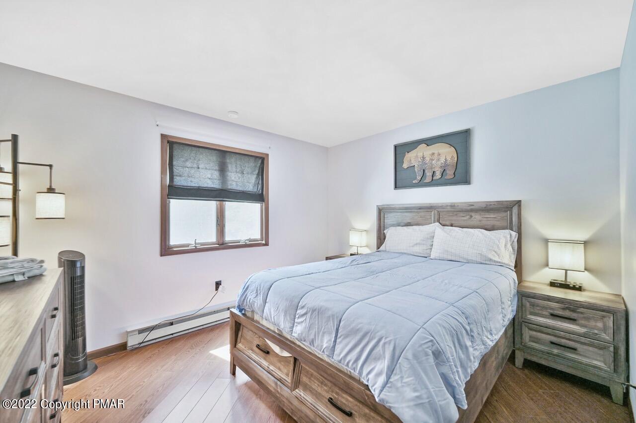 134 Moseywood Road Lake Harmony, PA 18624 - Photo 14 of 70 a bedroom with a bed and a window