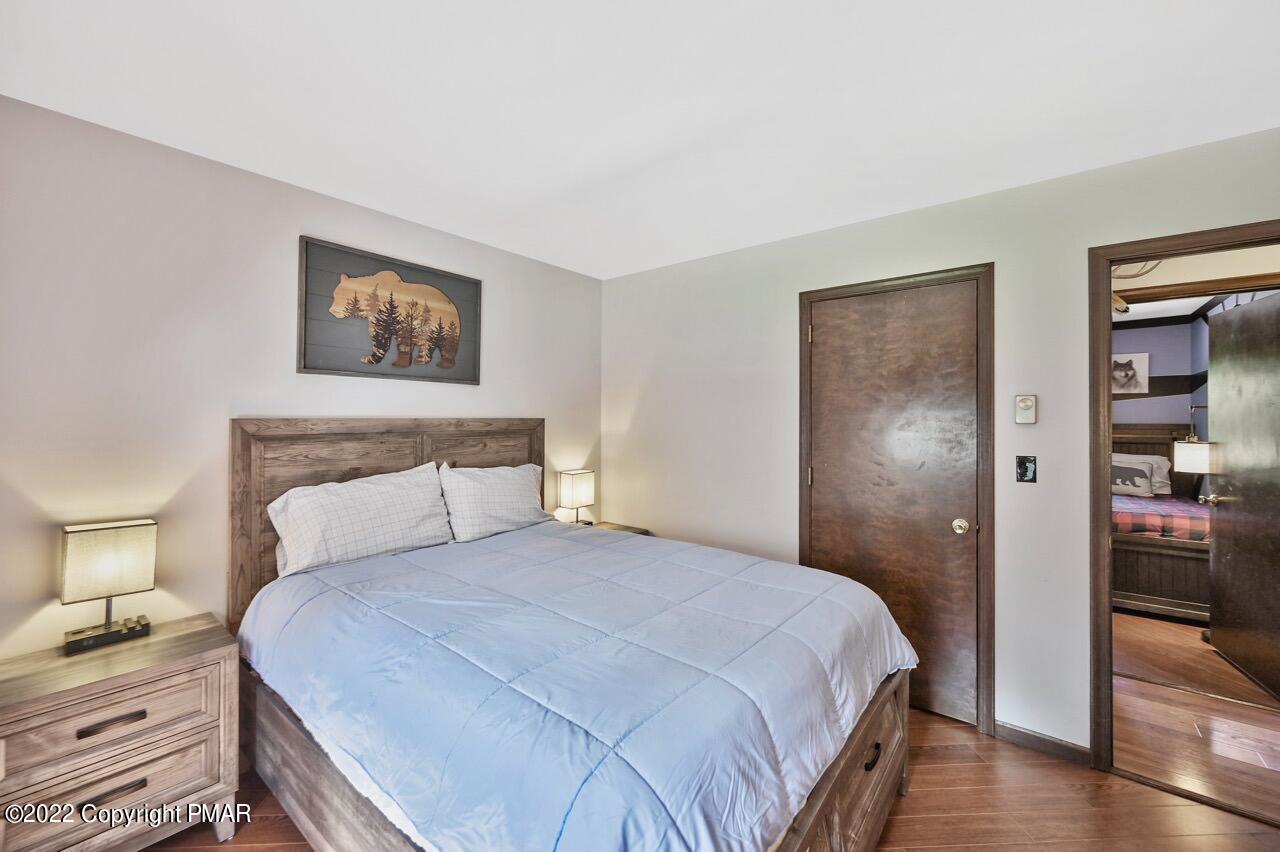 134 Moseywood Road Lake Harmony, PA 18624 - Photo 20 of 70 a bedroom with a bed and a view of bathroom