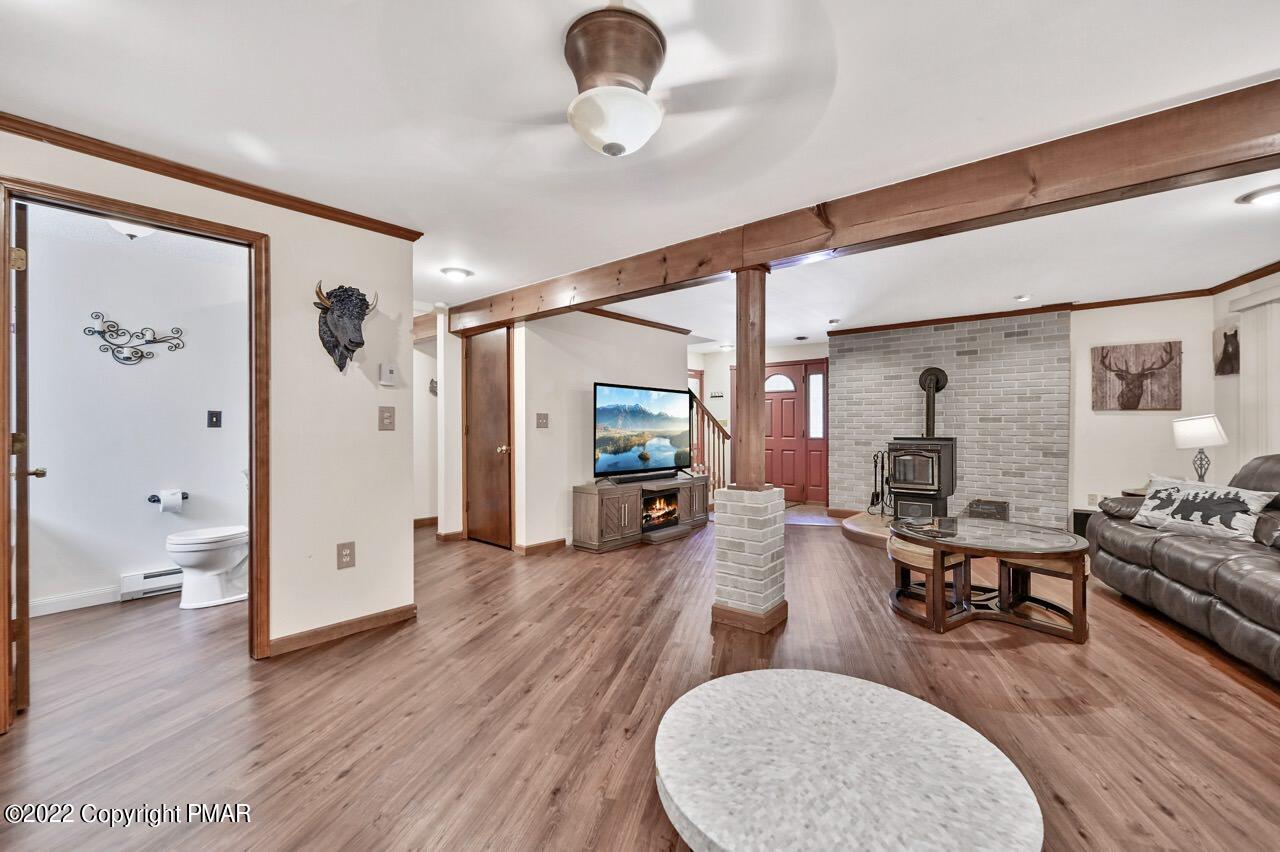 134 Moseywood Road Lake Harmony, PA 18624 - Photo 32 of 70 a living room with furniture and wooden floor