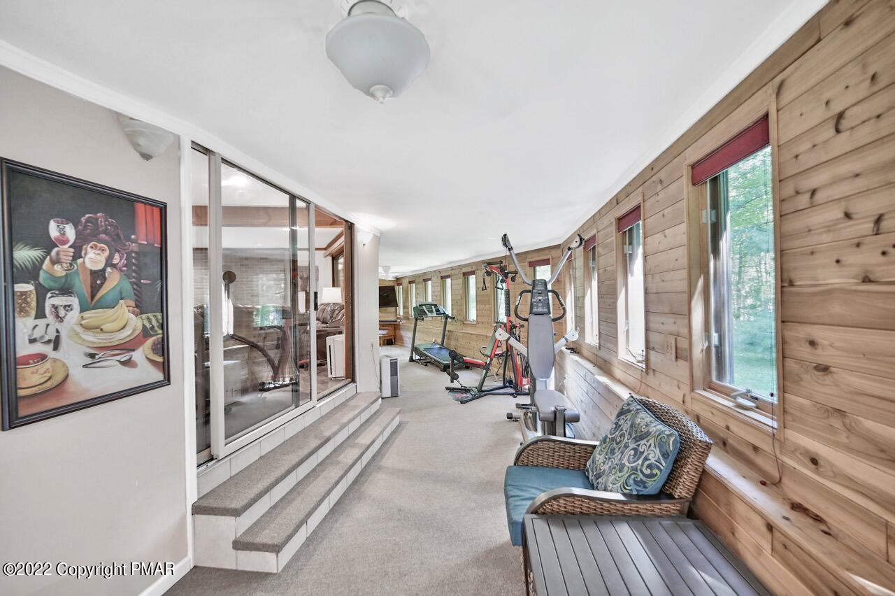 134 Moseywood Road Lake Harmony, PA 18624 - Photo 43 of 70 a living room with furniture and a painting on the wall
