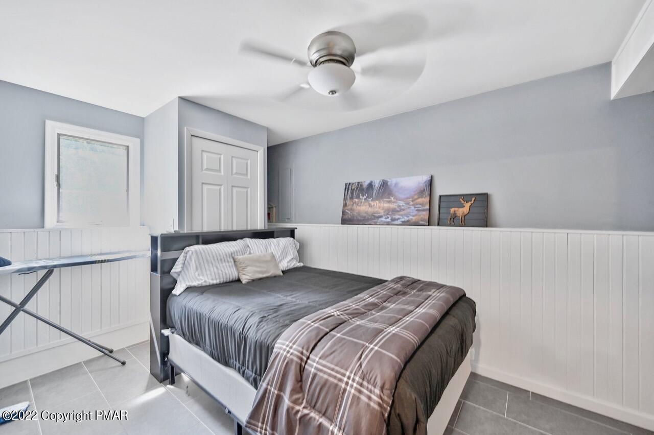 134 Moseywood Road Lake Harmony, PA 18624 - Photo 46 of 70 a bedroom with a bed and window