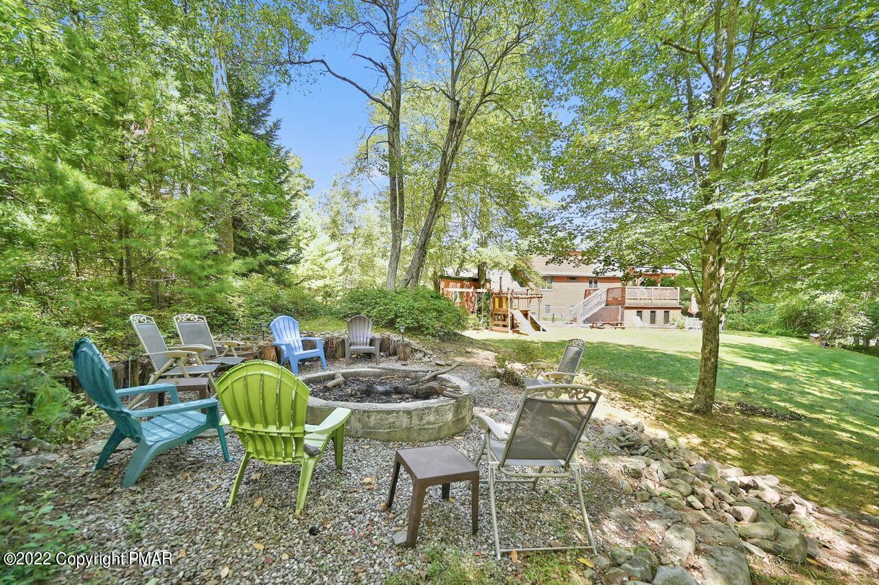 134 Moseywood Road Lake Harmony, PA 18624 - Photo 57 of 70 a view of a chairs and table in backyard