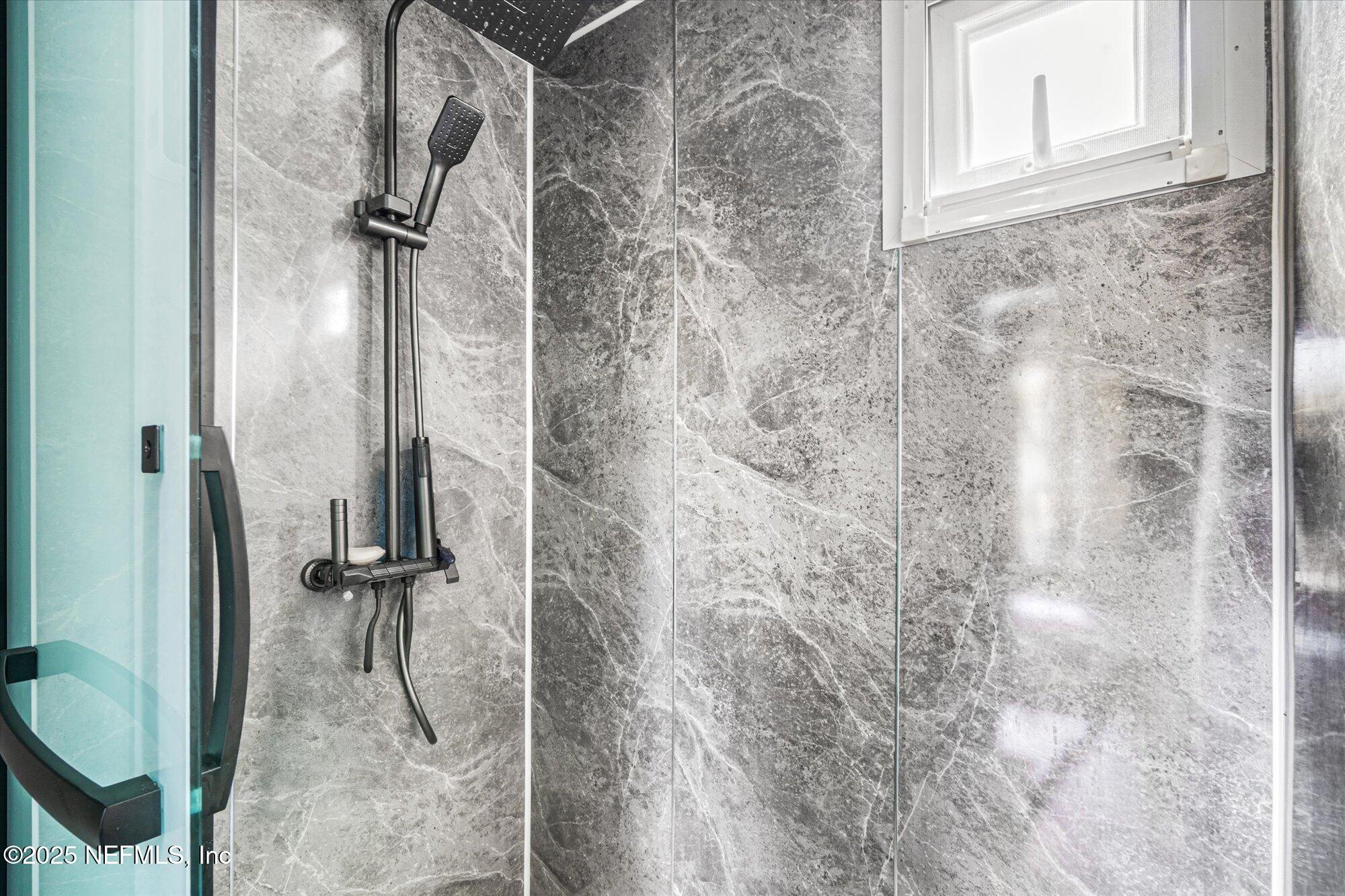 191 County Landfill Road Palatka, FL 32177 - Photo 16 of 37 a bathroom with a shower