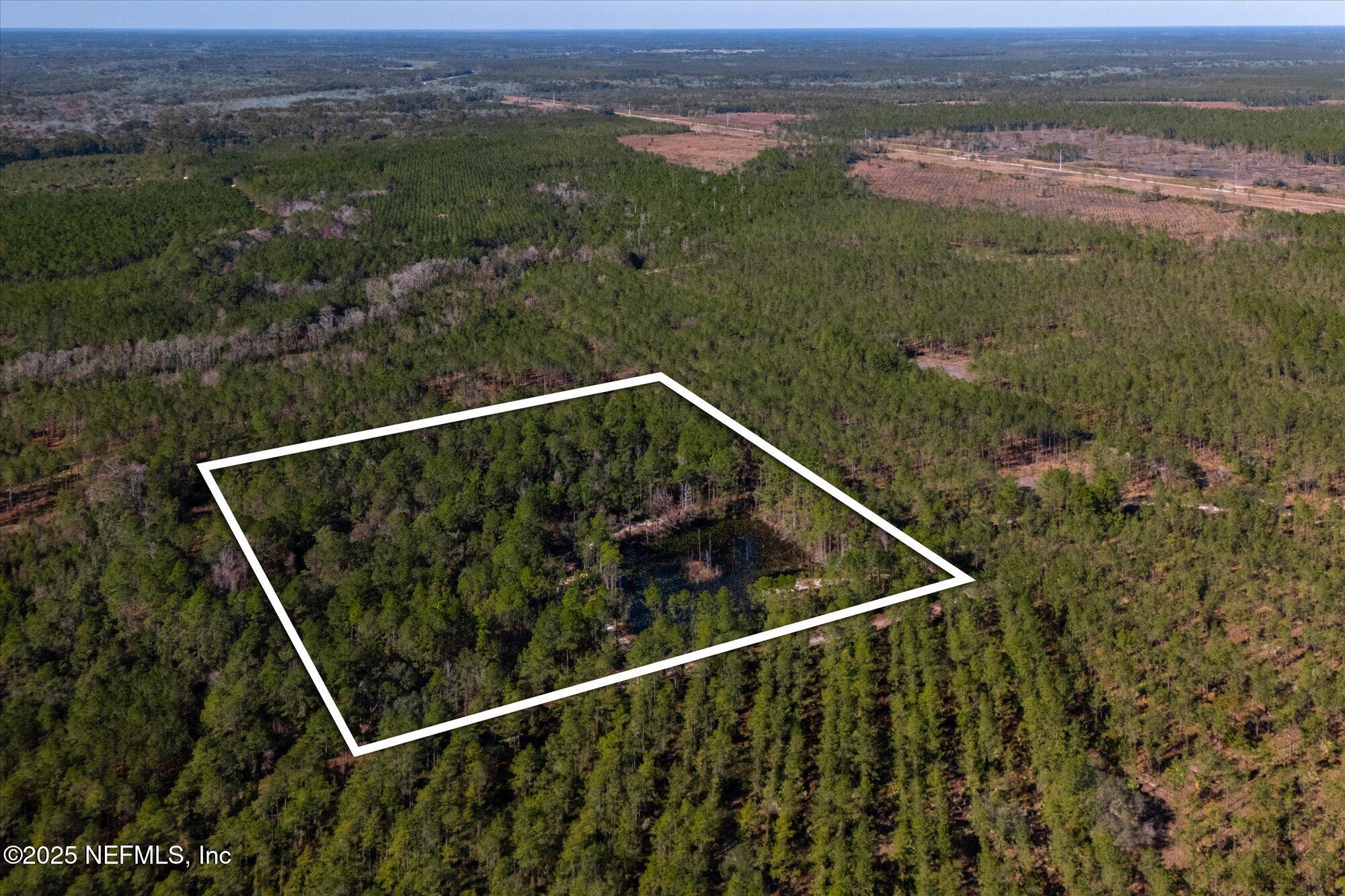 191 County Landfill Road Palatka, FL 32177 - Photo 23 of 37 a view of a balcony with an outdoor space