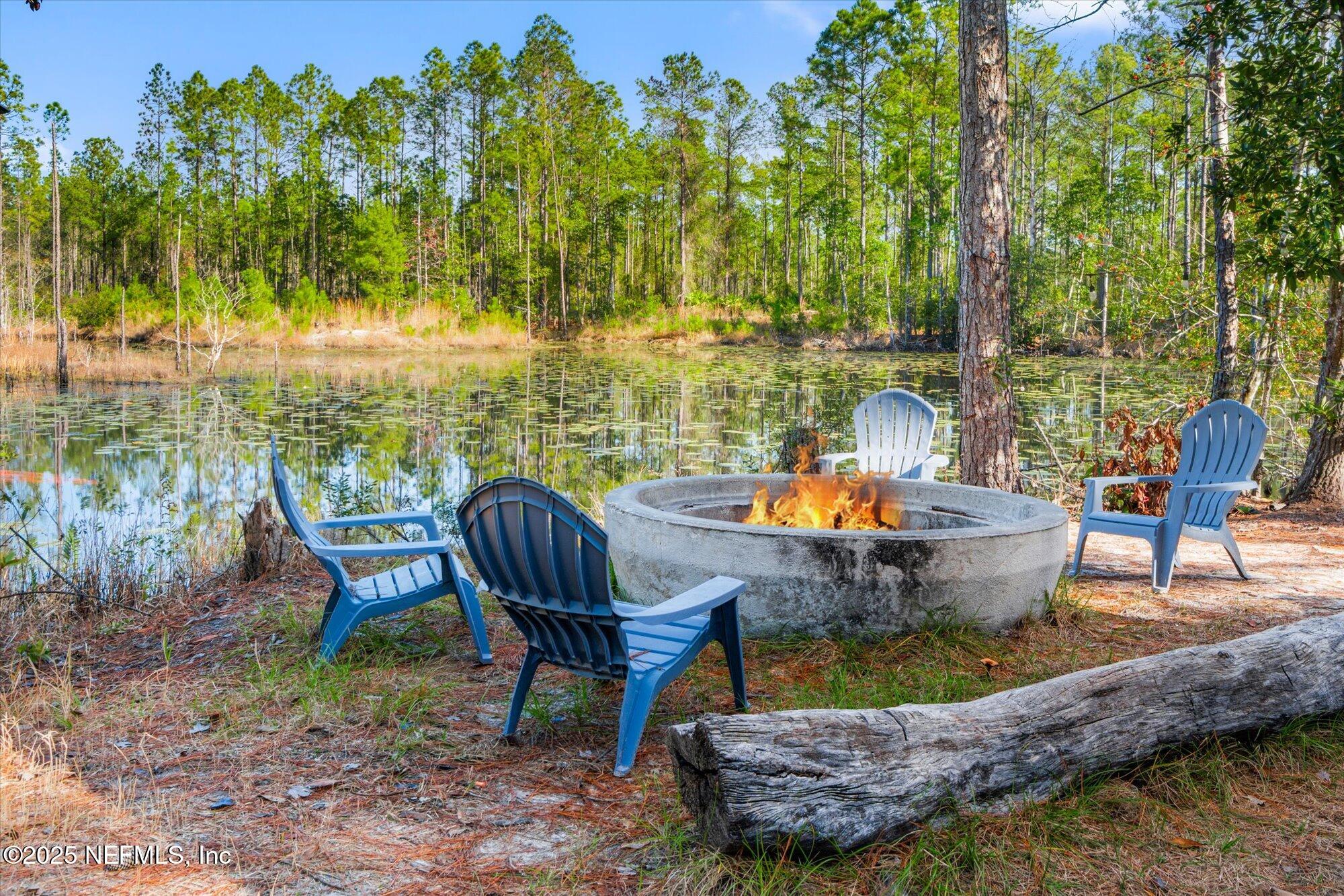 191 County Landfill Road Palatka, FL 32177 - Photo 5 of 37 a view of outdoor sitting area with furniture and swimming pool