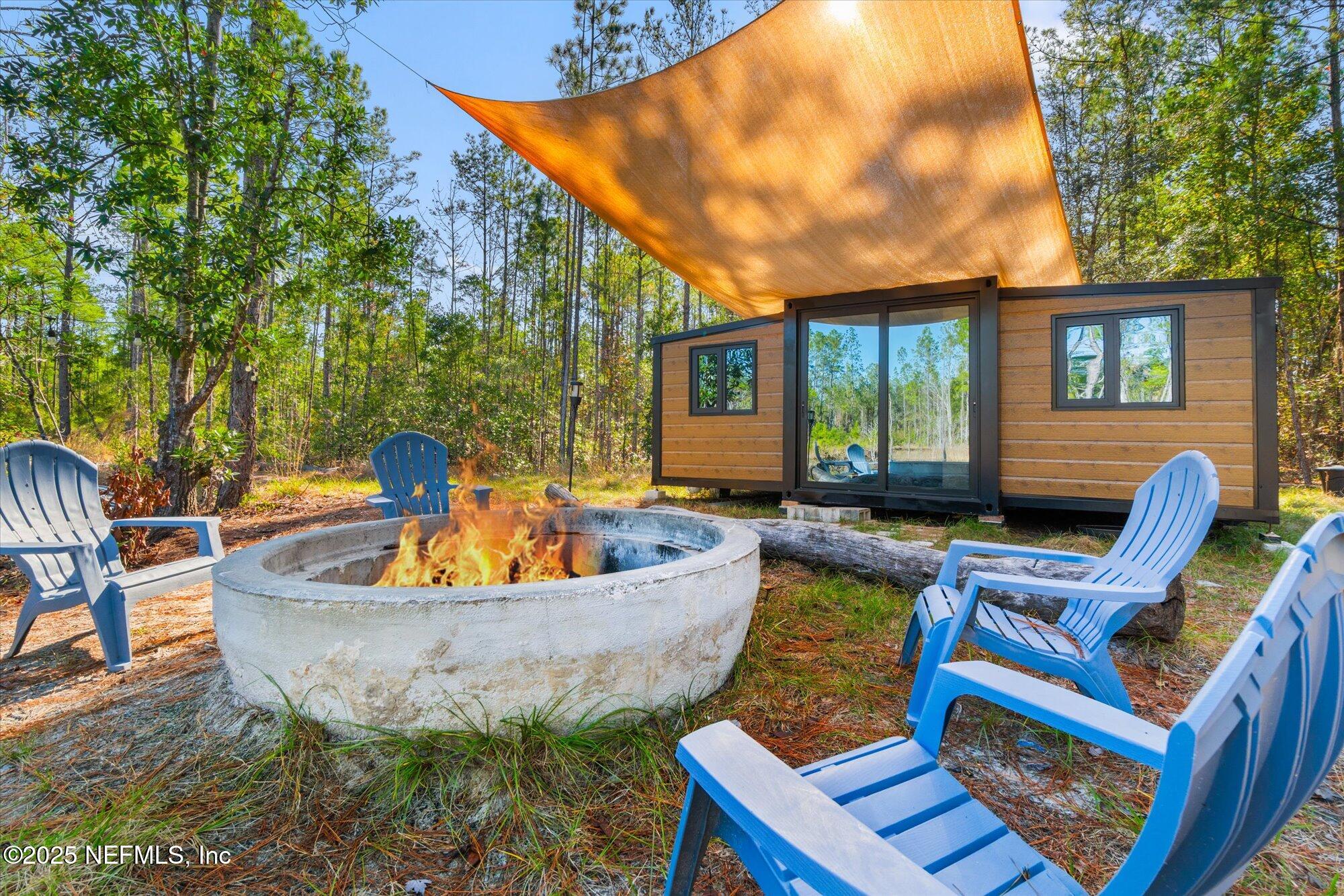 191 County Landfill Road Palatka, FL 32177 - Photo 6 of 37 a view of a swimming pool with a patio