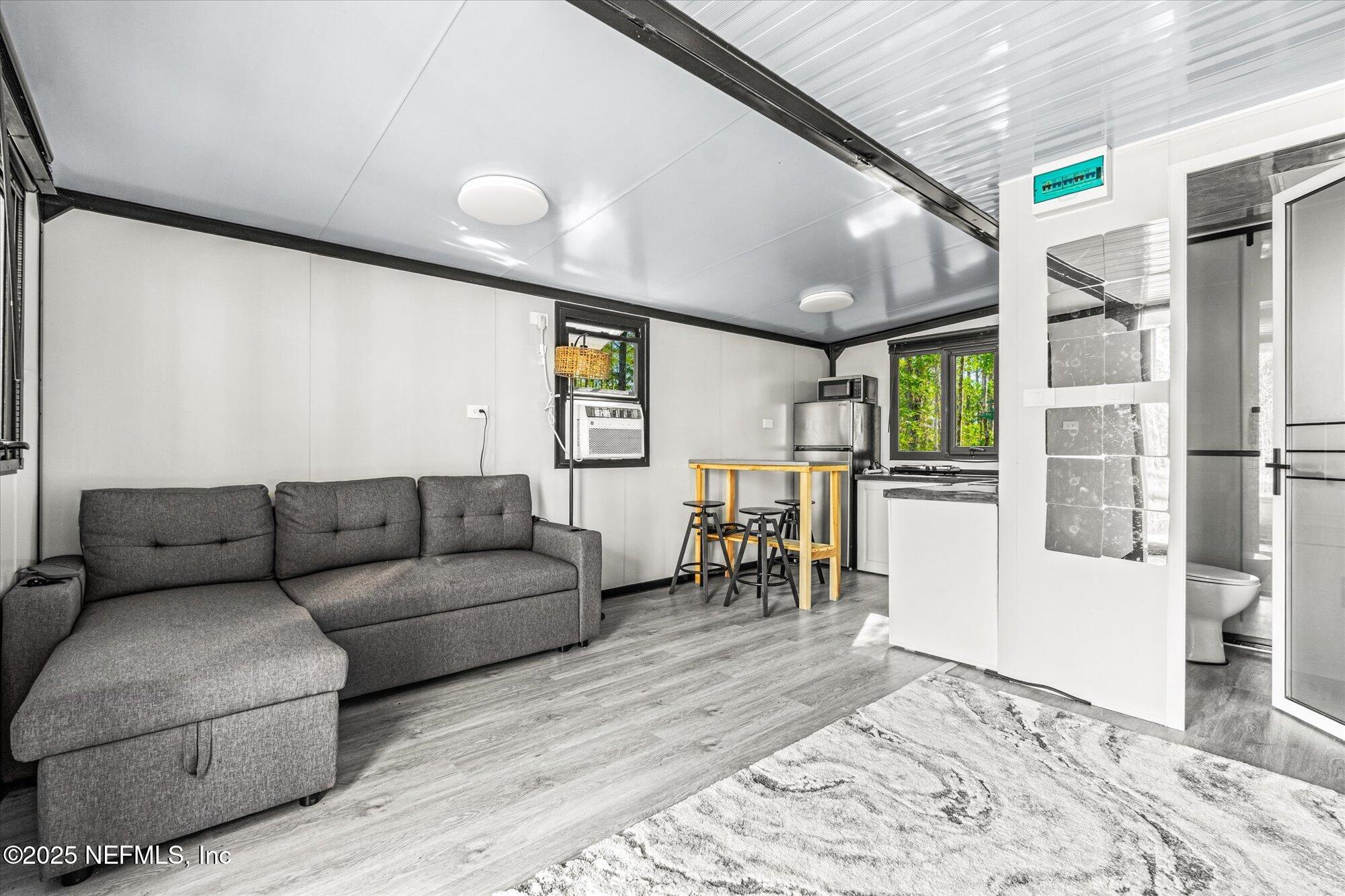 191 County Landfill Road Palatka, FL 32177 - Photo 9 of 37 a living room with furniture and a table
