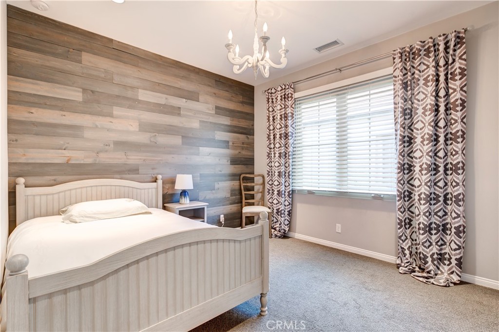 72 Cherry Tree Irvine, CA 92620 - Photo 13 of 15 a bedroom with a bed and a window