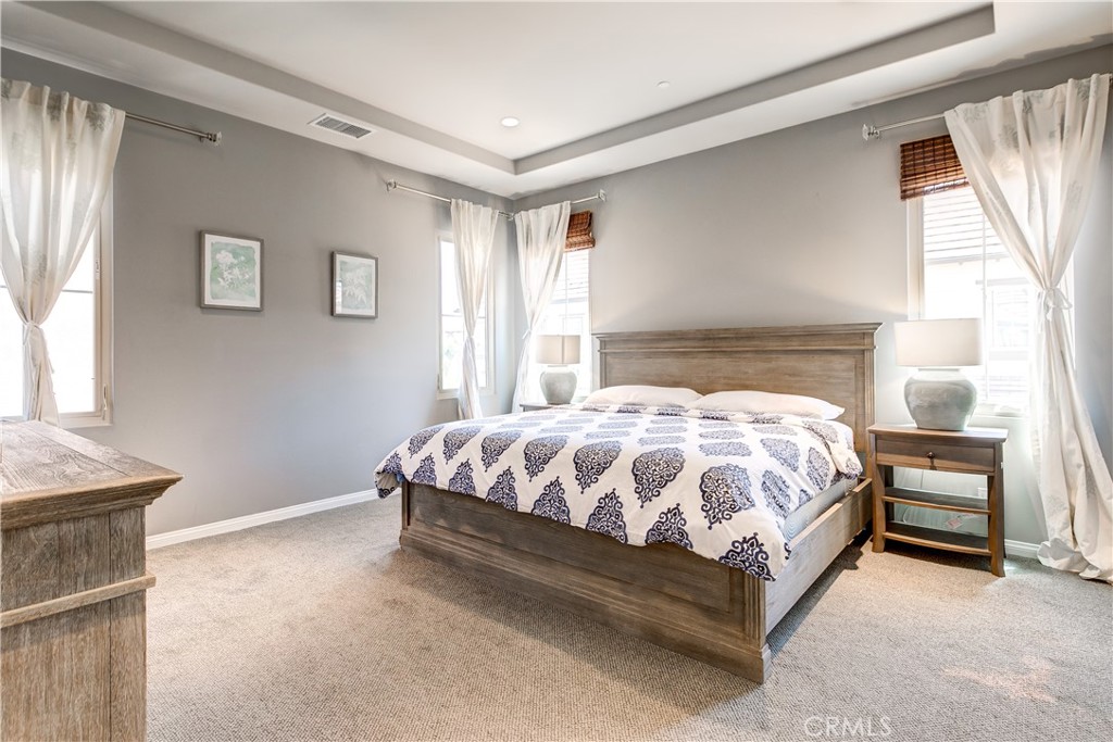 72 Cherry Tree Irvine, CA 92620 - Photo 9 of 15 a bedroom with a bed and a window