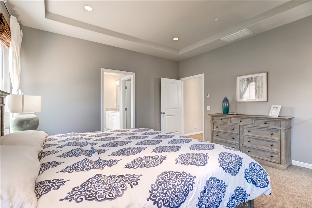 72 Cherry Tree Irvine, CA 92620 - Photo 10 of 15 a bedroom with a bed and a dresser