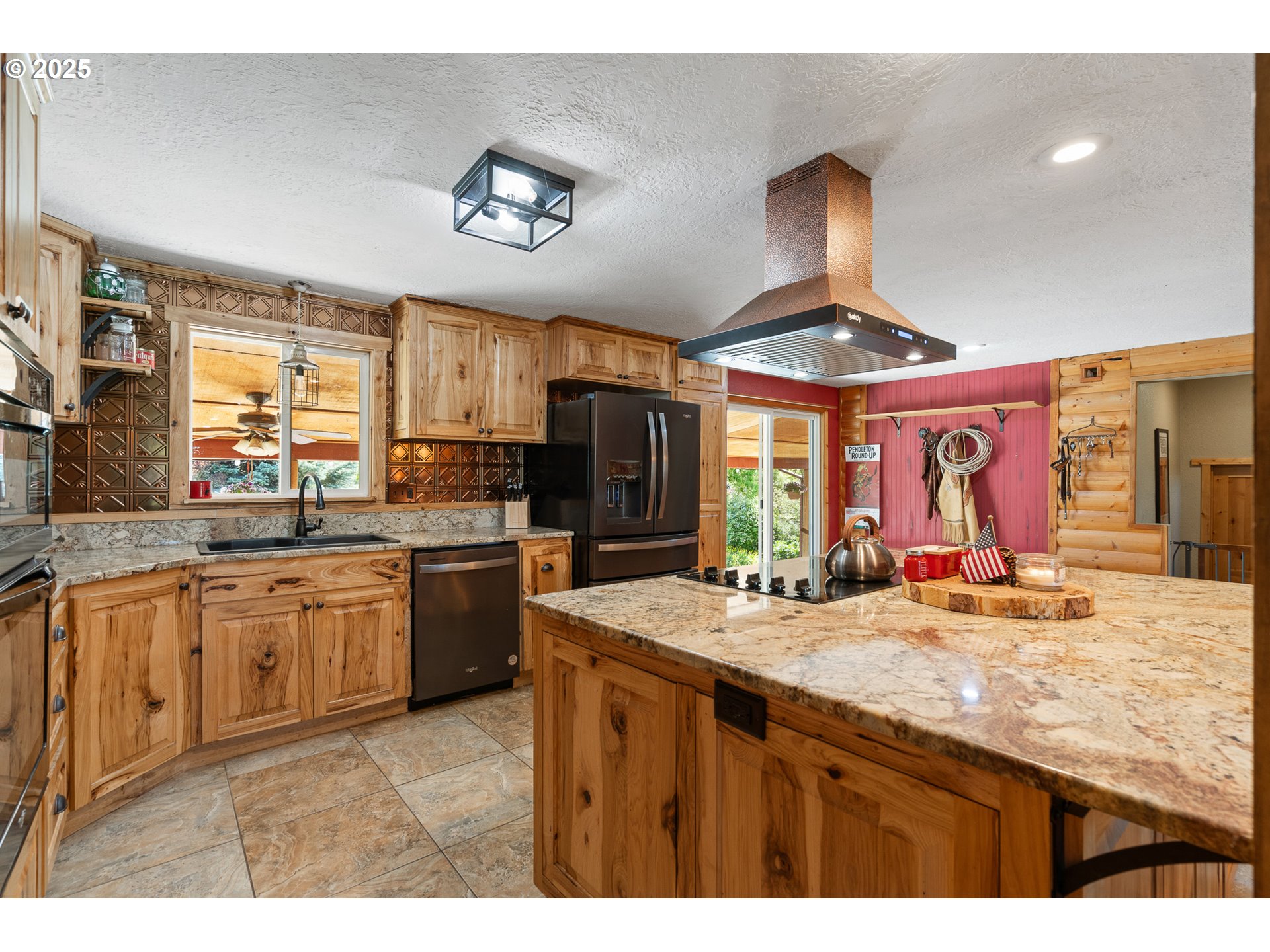 73594 Davis Lane Pendleton, OR 97801 - Photo 15 of 48 a kitchen with stainless steel appliances granite countertop a sink stove and refrigerator