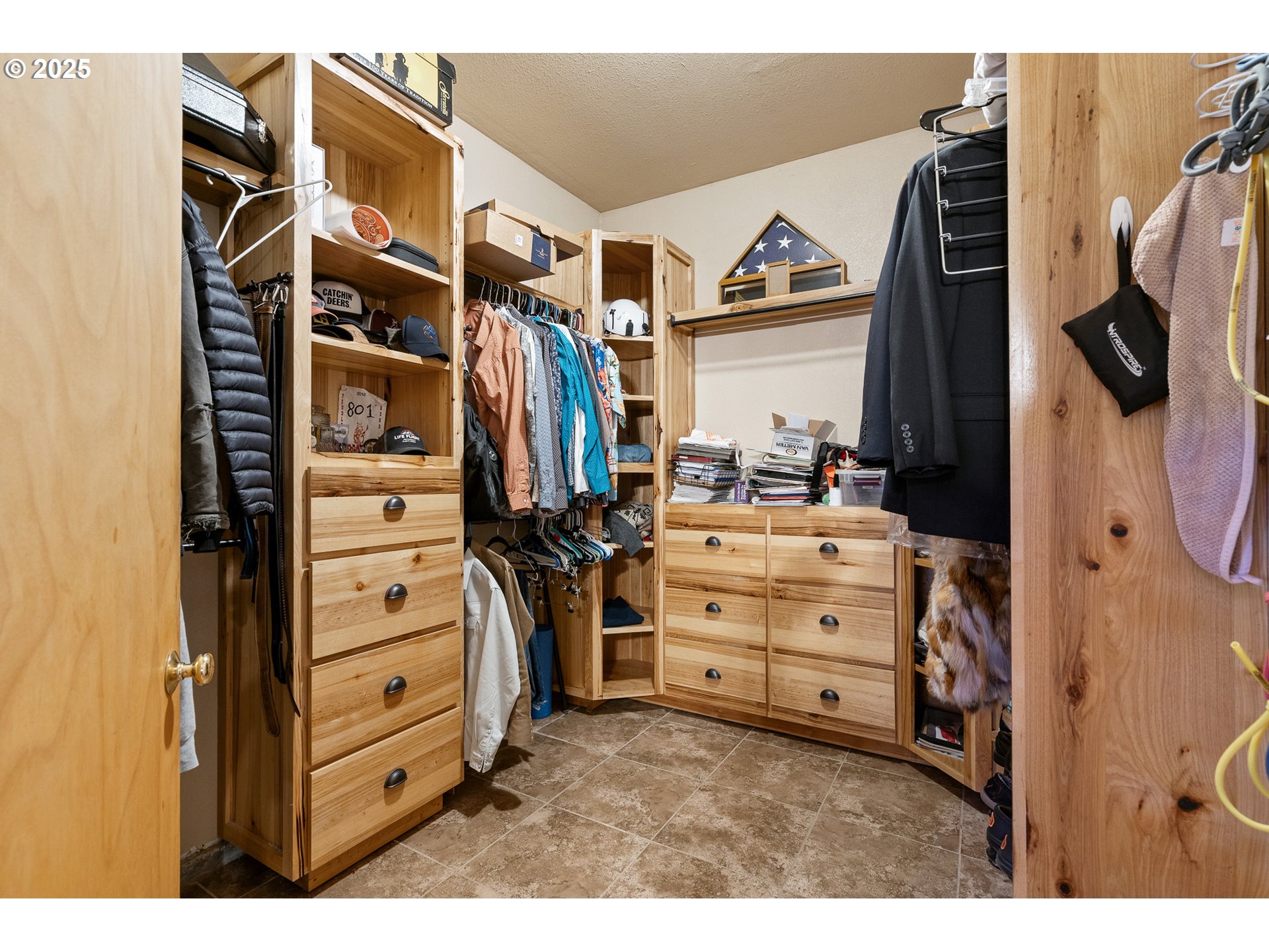73594 Davis Lane Pendleton, OR 97801 - Photo 20 of 48 a view of walk in closet with clothes and shoes