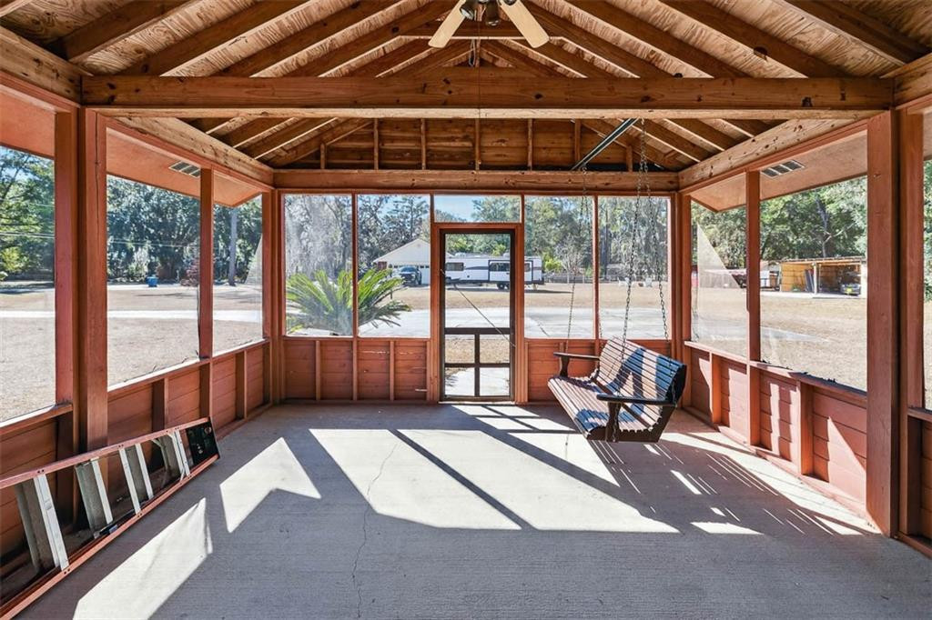 161 Navajo Road Brunswick, GA 31525 - Photo 1 of 46 Relax in the screened porch!