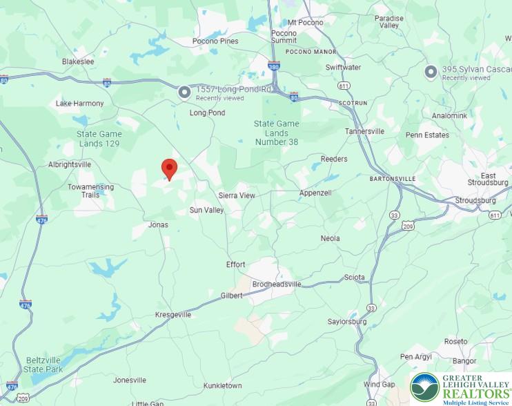 436 Mountain Road, Unit 404 Albrightsville, PA 18210 - Photo 2 of 6 a white bath tub sitting next to a white door