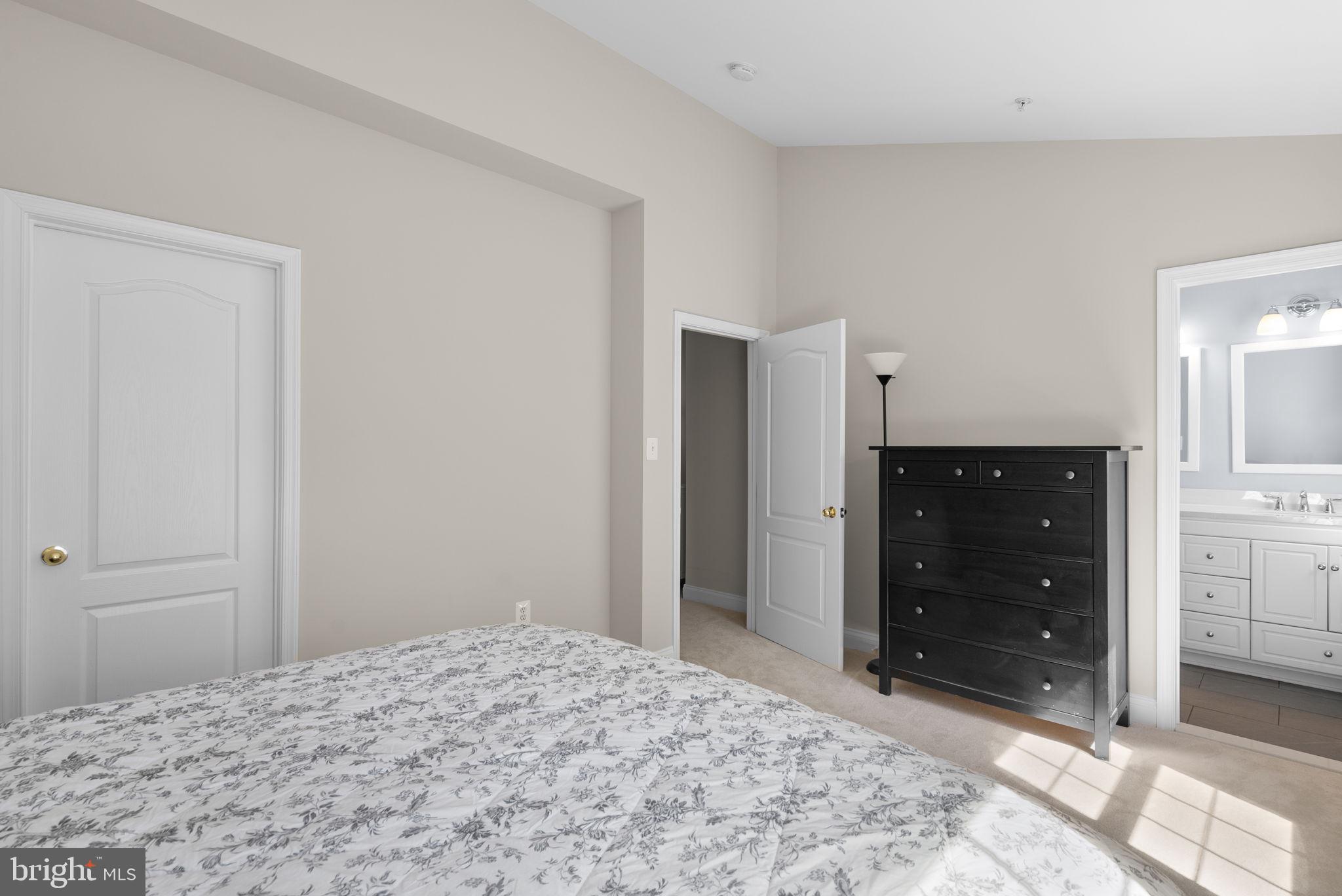 215 Poplar Spring Road Rockville, MD 20850 - Photo 15 of 30 a bedroom with a bed and a dresser