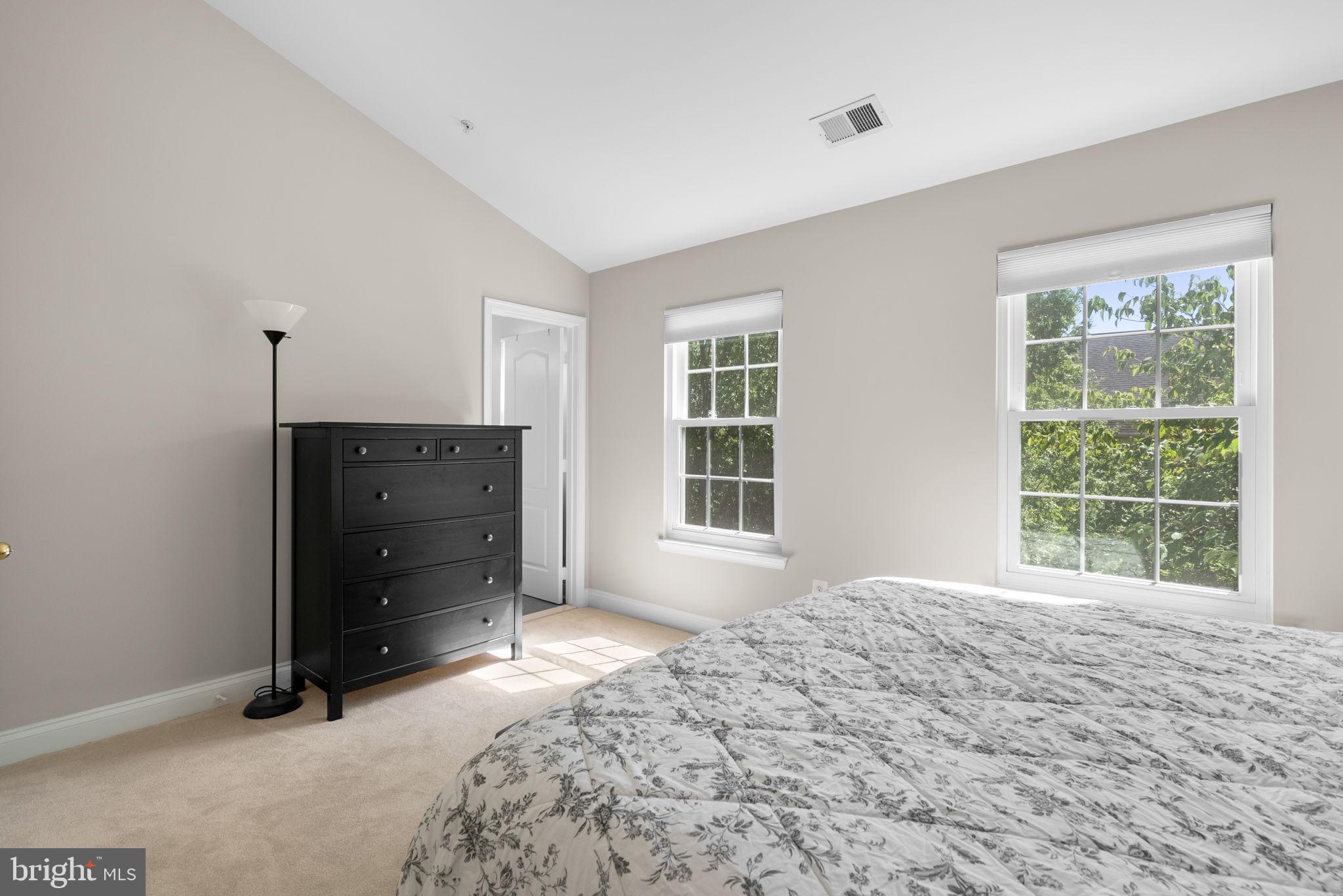 215 Poplar Spring Road Rockville, MD 20850 - Photo 16 of 30 a bedroom with a bed and window