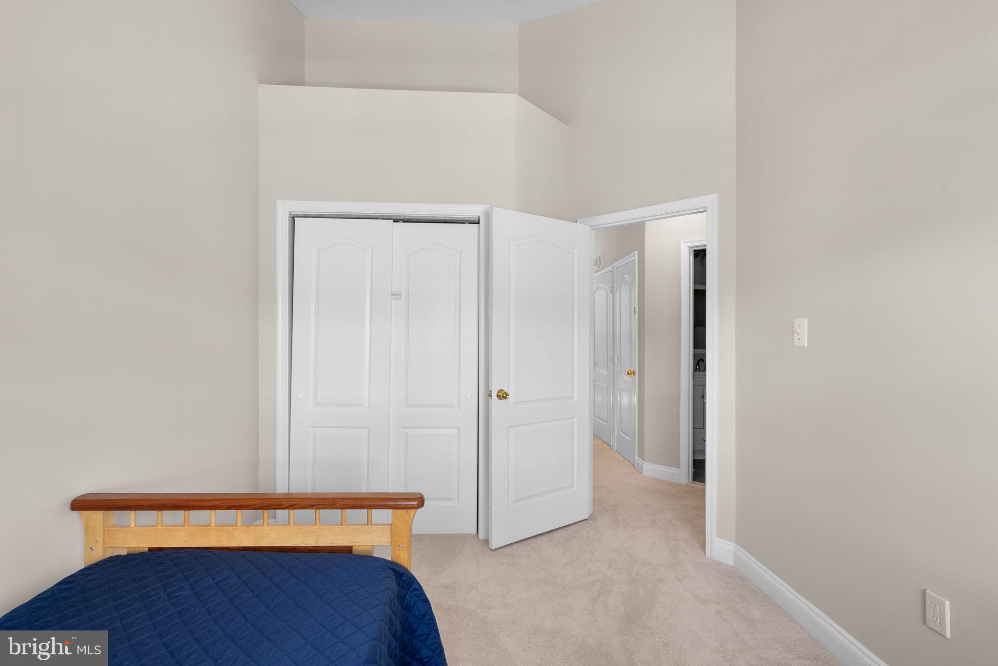 215 Poplar Spring Road Rockville, MD 20850 - Photo 19 of 30 a view of room with closet and wooden floor
