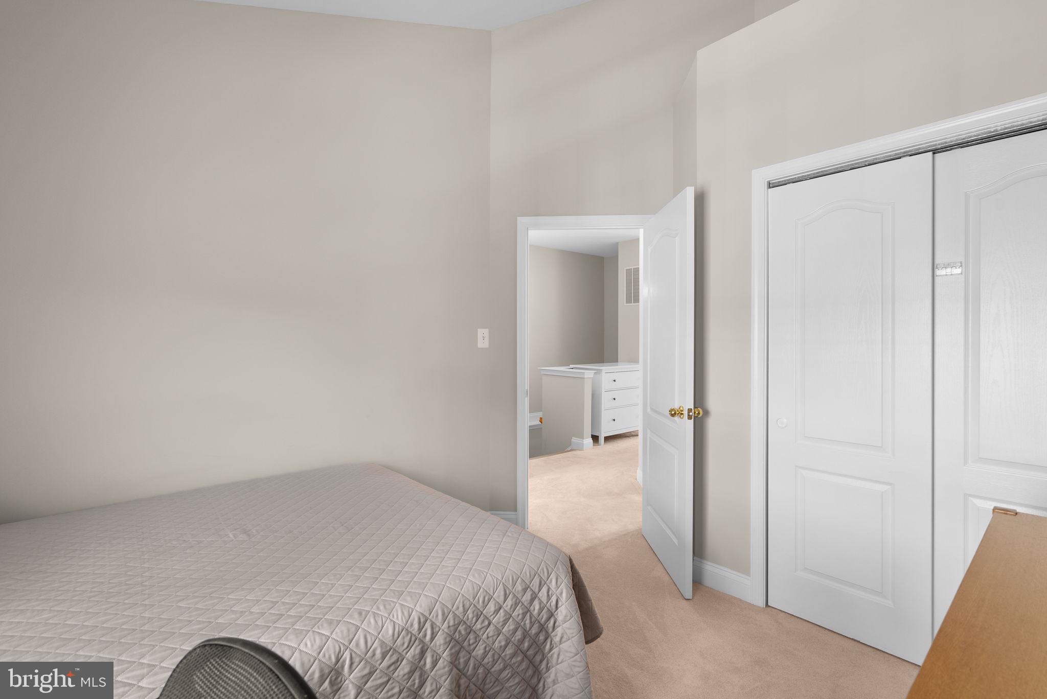 215 Poplar Spring Road Rockville, MD 20850 - Photo 21 of 30 a bedroom with a bed and a view