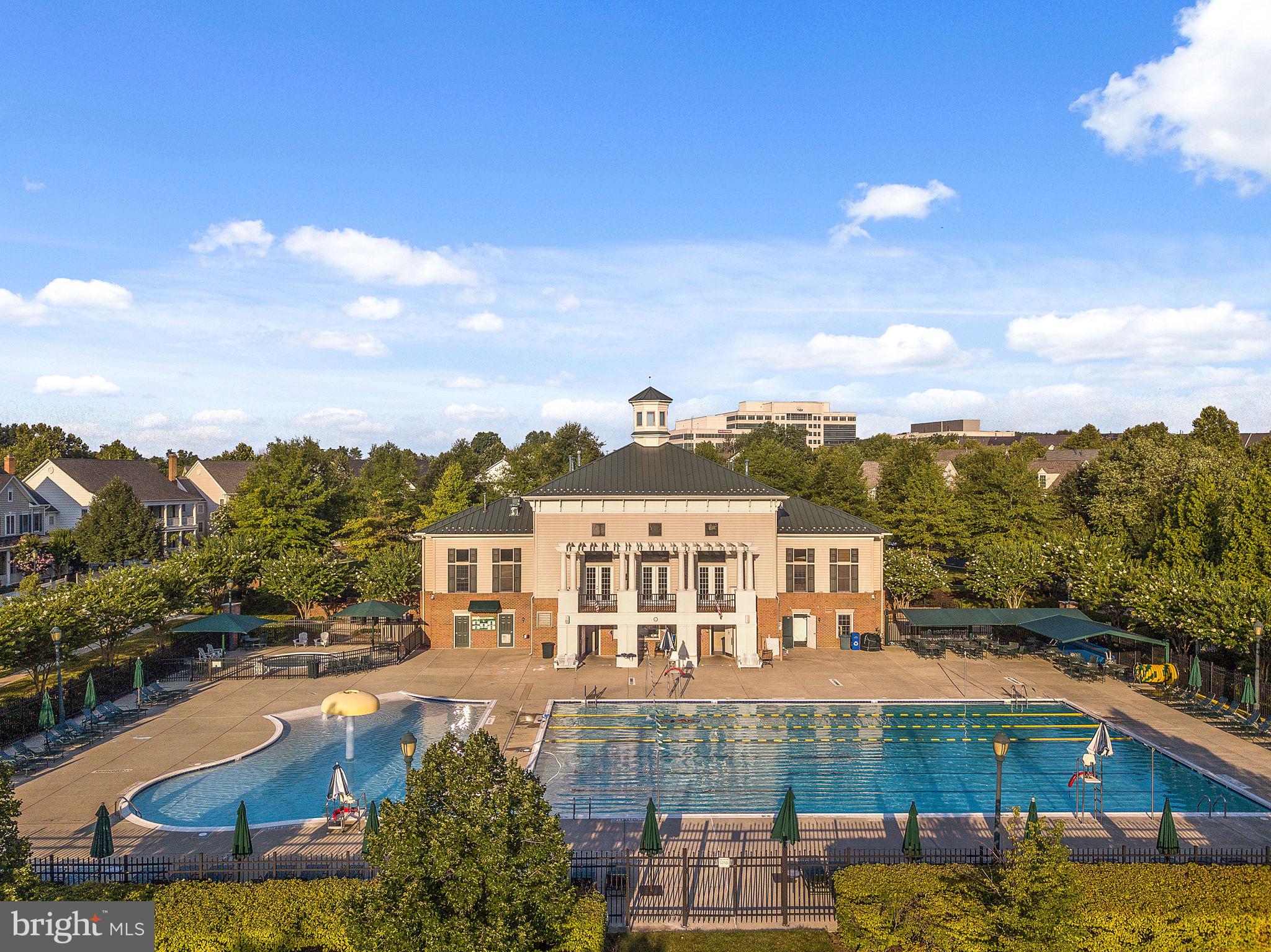 215 Poplar Spring Road Rockville, MD 20850 - Photo 26 of 30 a view of a lake with a building in the background