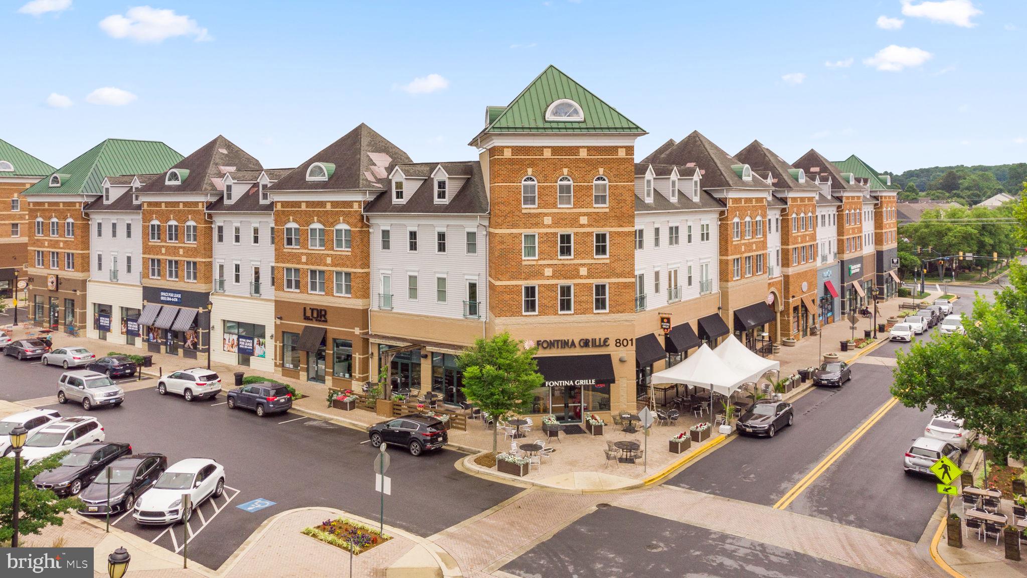 215 Poplar Spring Road Rockville, MD 20850 - Photo 29 of 30 a view of a patio with couches and potted plants