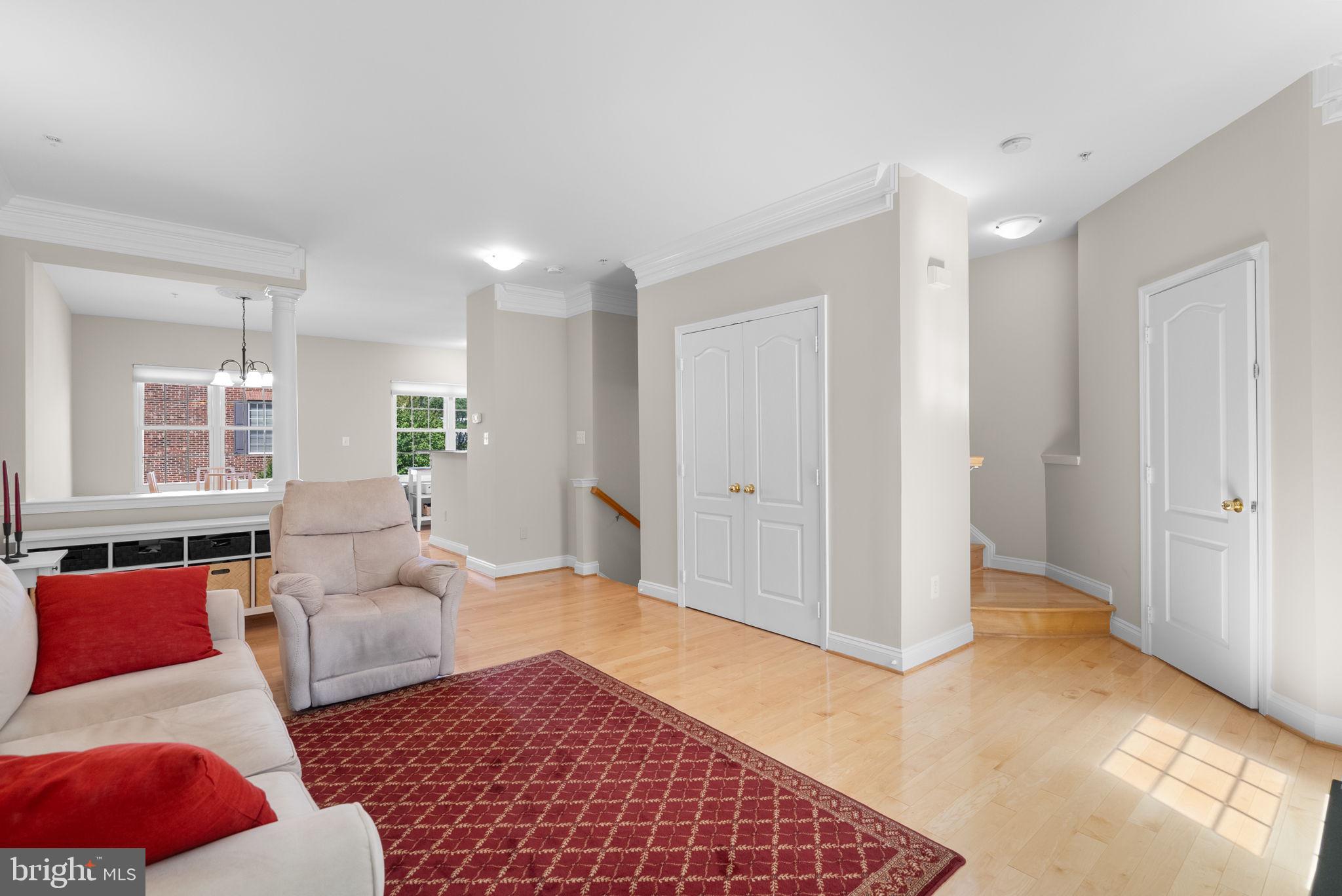215 Poplar Spring Road Rockville, MD 20850 - Photo 5 of 30 a living room with furniture and a rug
