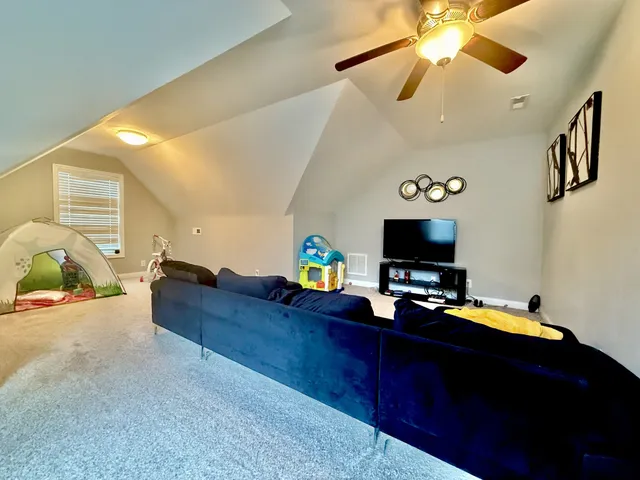 a bedroom with a workspace