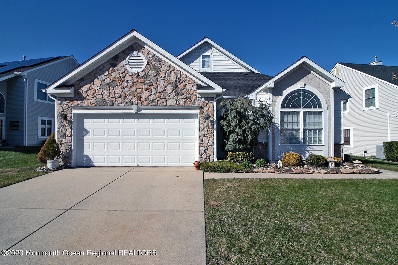 27 Pancoast Road Waretown, NJ 08758 - Photo 1 of 37 a front view of a house with garden