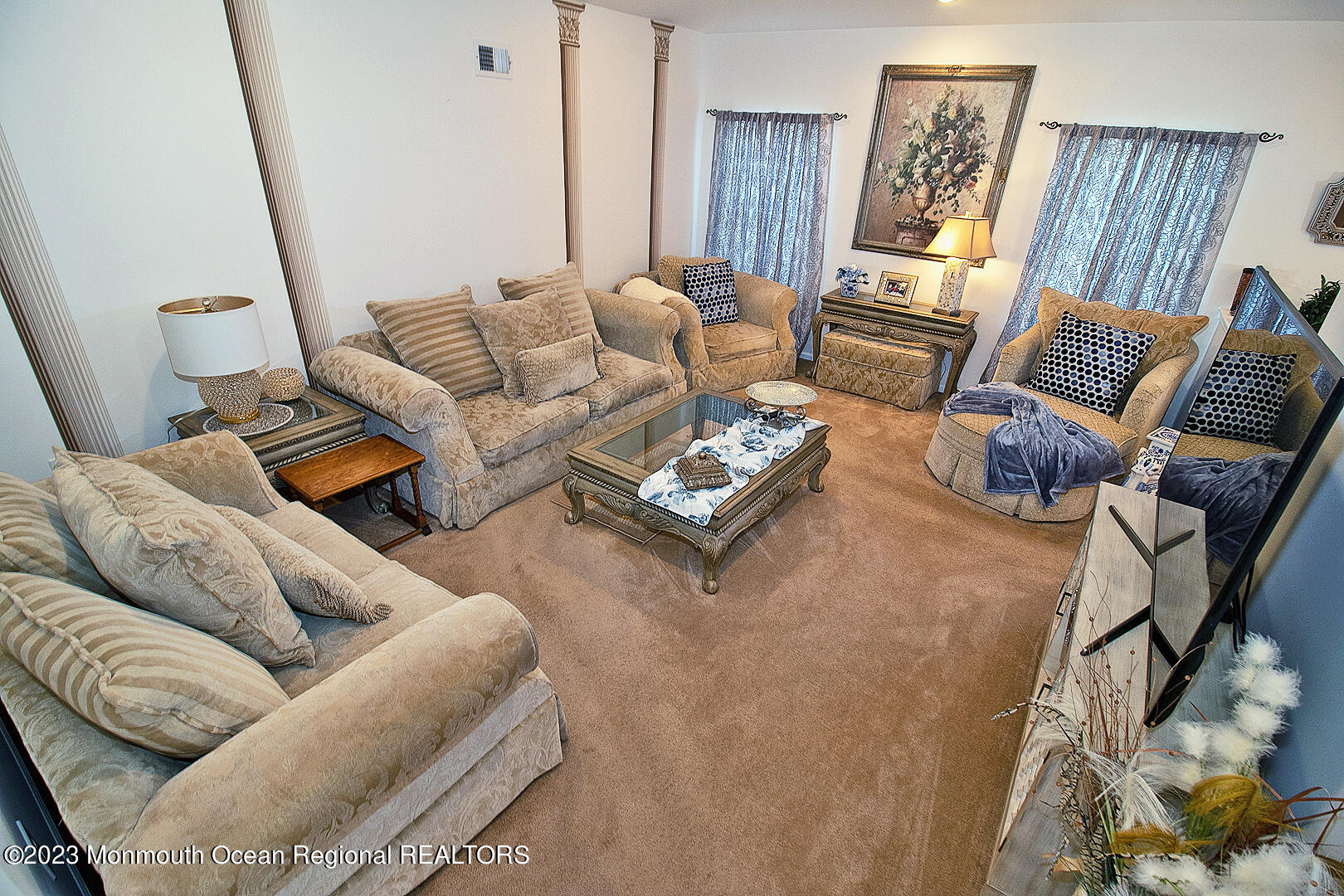 27 Pancoast Road Waretown, NJ 08758 - Photo 15 of 37 a living room with furniture and a couch