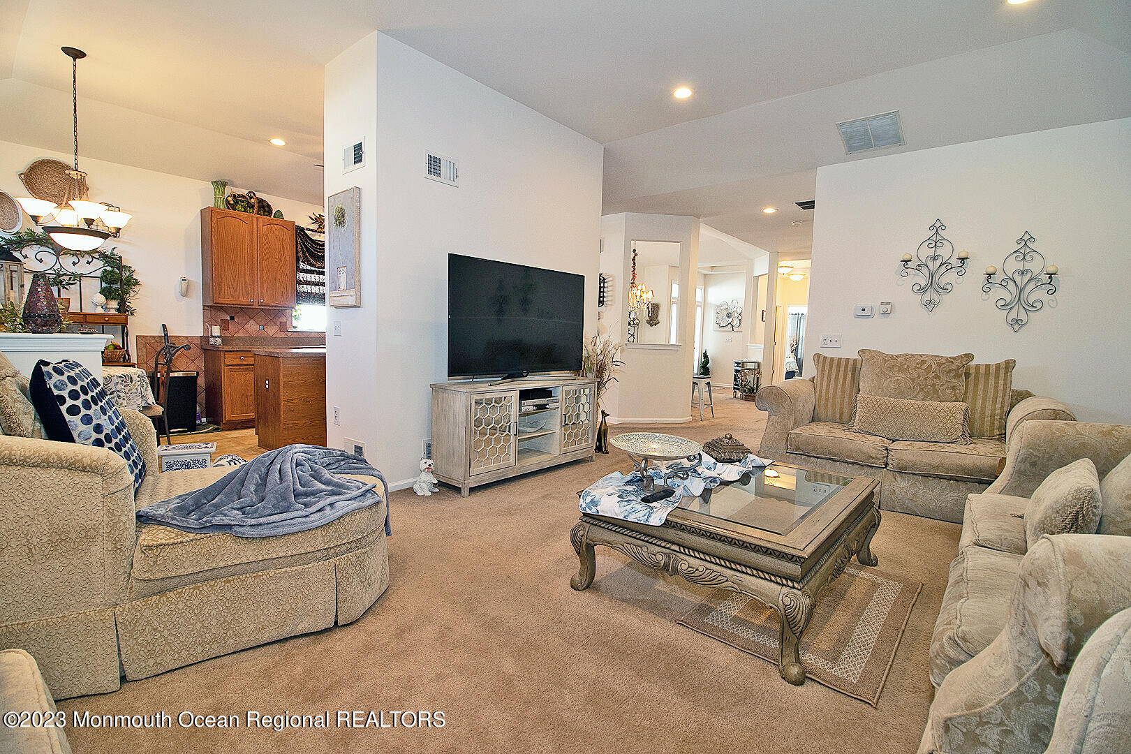 27 Pancoast Road Waretown, NJ 08758 - Photo 16 of 37 a living room with furniture a rug and a flat screen tv