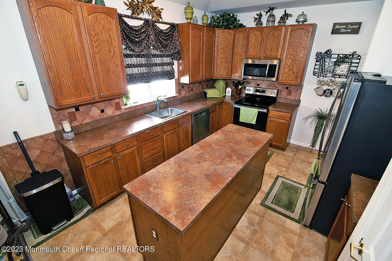 27 Pancoast Road Waretown, NJ 08758 - Photo 19 of 37 a kitchen with a sink appliances and cabinets