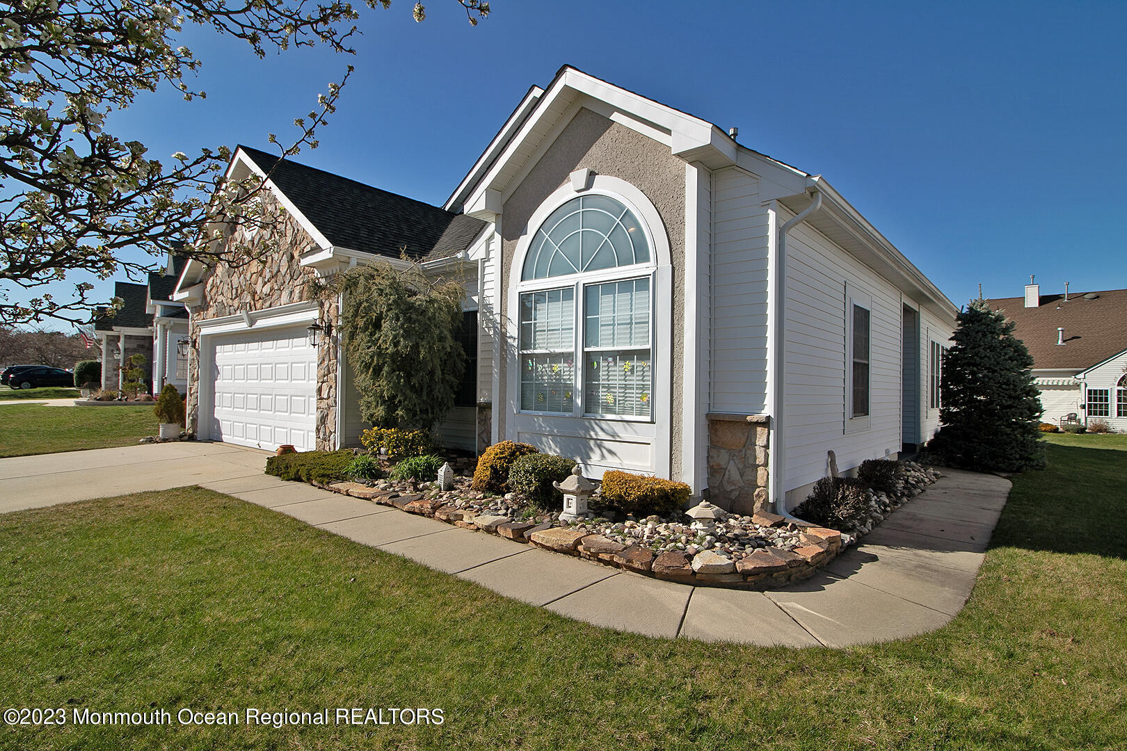 27 Pancoast Road Waretown, NJ 08758 - Photo 2 of 37 a front view of a house with a yard
