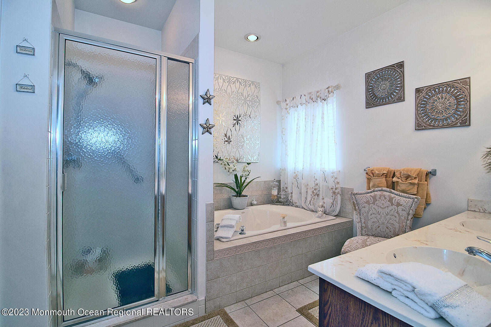 27 Pancoast Road Waretown, NJ 08758 - Photo 24 of 37 a bathroom with a bathtub shower sink mirror and toilet