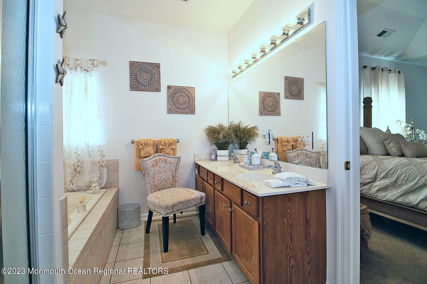 27 Pancoast Road Waretown, NJ 08758 - Photo 25 of 37 a en suite bathroom with a granite countertop sink and a mirror