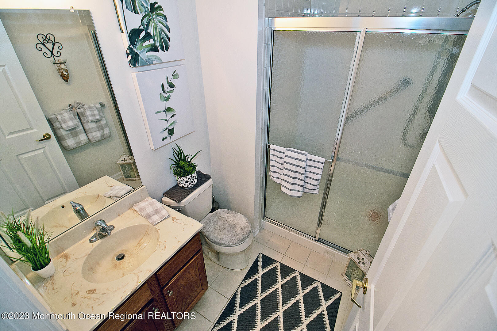 27 Pancoast Road Waretown, NJ 08758 - Photo 29 of 37 a bathroom with a sink and mirror with toilet