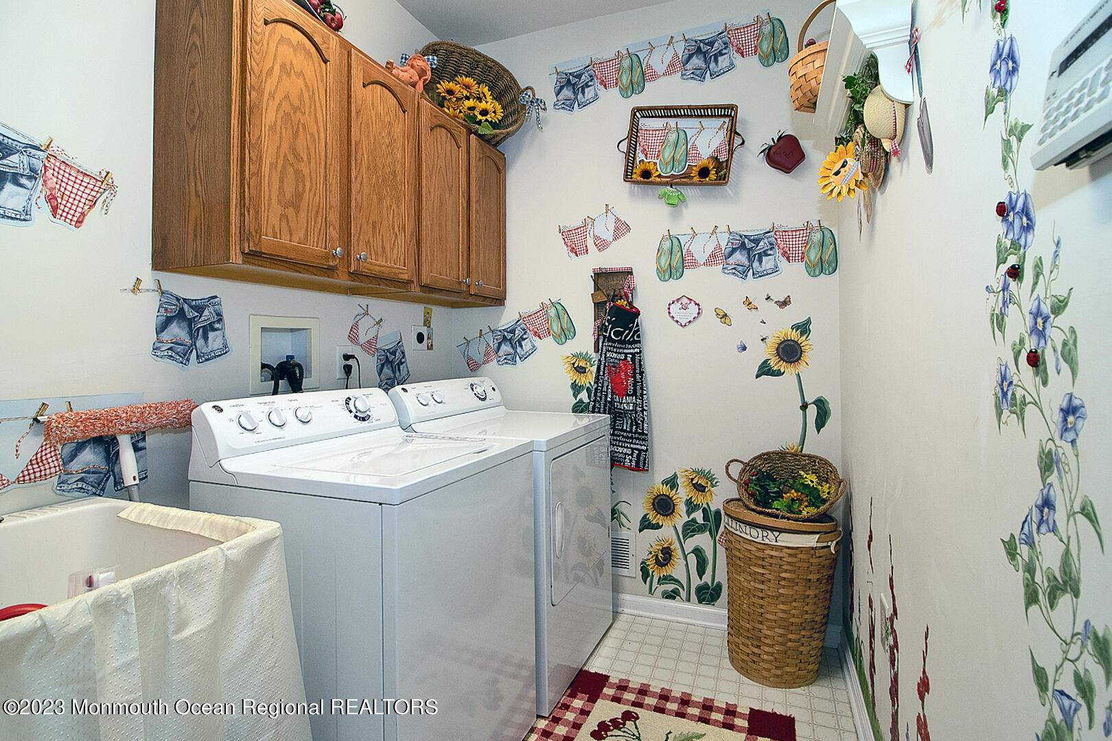 27 Pancoast Road Waretown, NJ 08758 - Photo 32 of 37 a storage room with stainless steel appliances a stove and a microwave