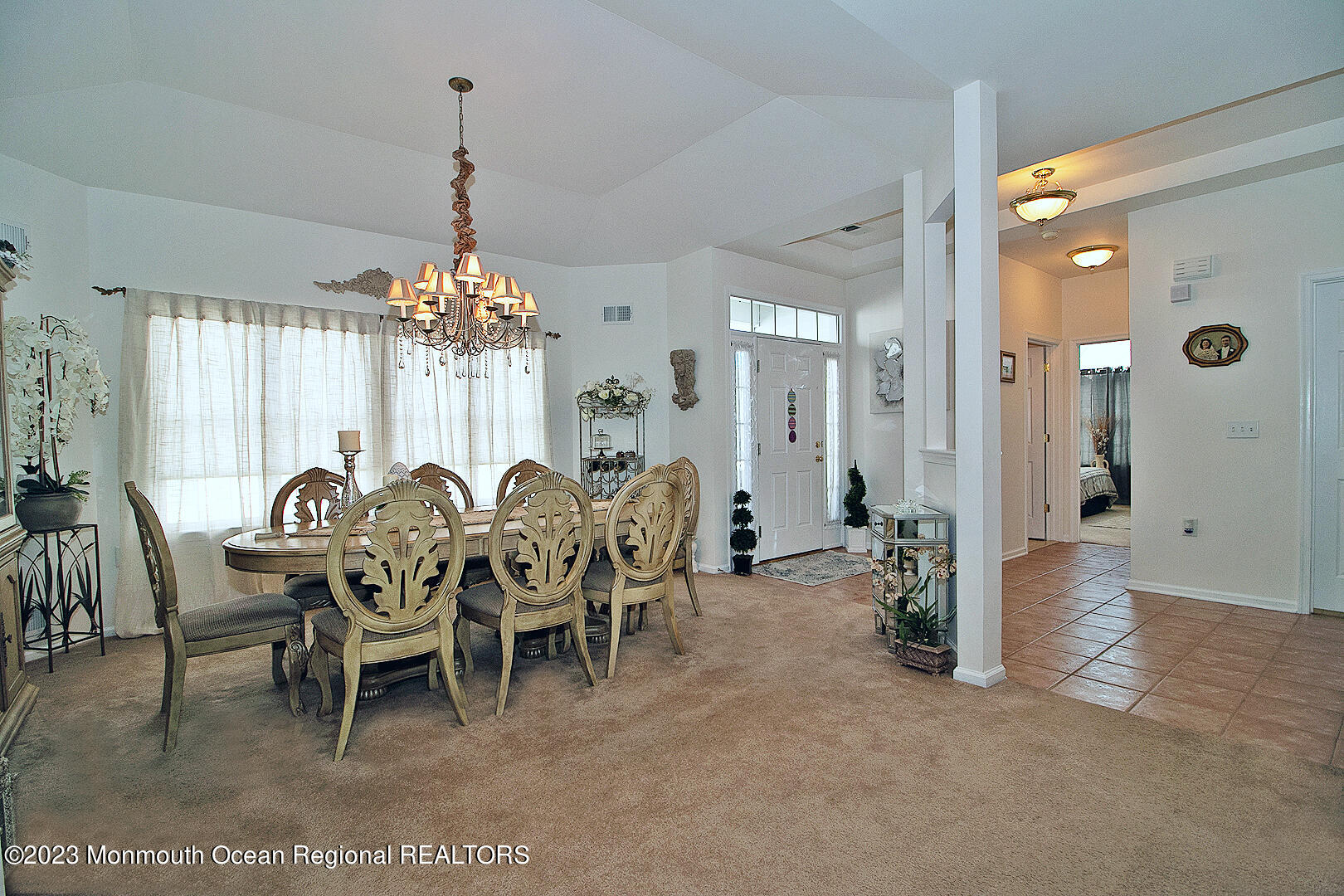 27 Pancoast Road Waretown, NJ 08758 - Photo 5 of 37 a view of a dining room with furniture and chandelier