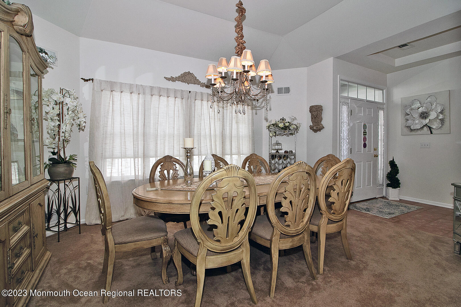 27 Pancoast Road Waretown, NJ 08758 - Photo 6 of 37 a view of a dining room with furniture and chandelier