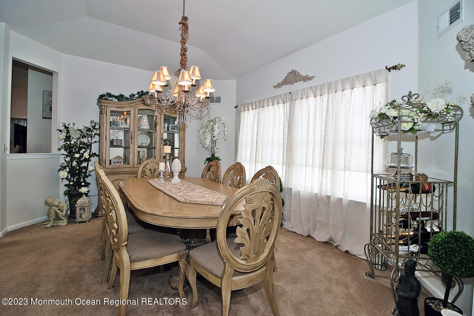 27 Pancoast Road Waretown, NJ 08758 - Photo 7 of 37 a view of a dining room with furniture and chandelier