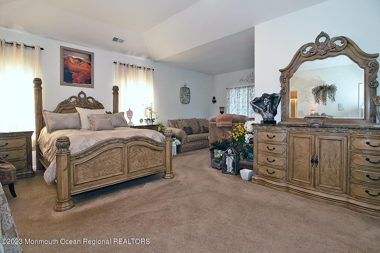 27 Pancoast Road Waretown, NJ 08758 - Photo 9 of 37 a living room with furniture and a mirror