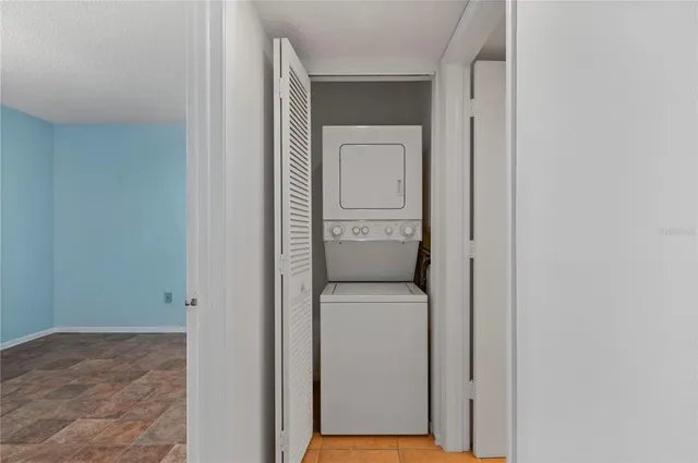 an aerial view of a house with outdoor space swimming pool and mountain view