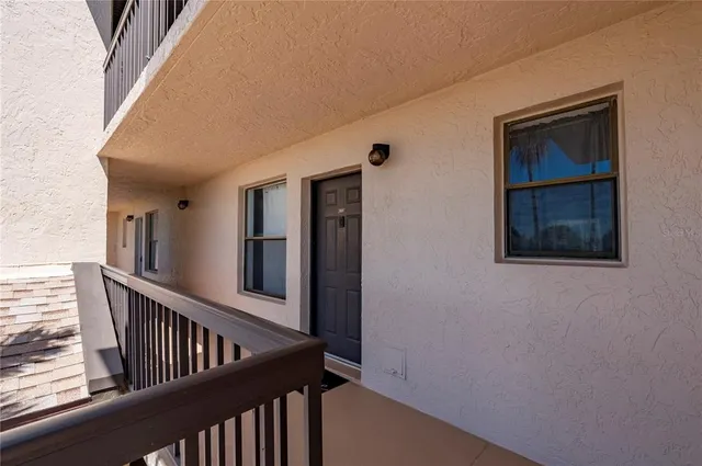 a view of a hallway with staircase