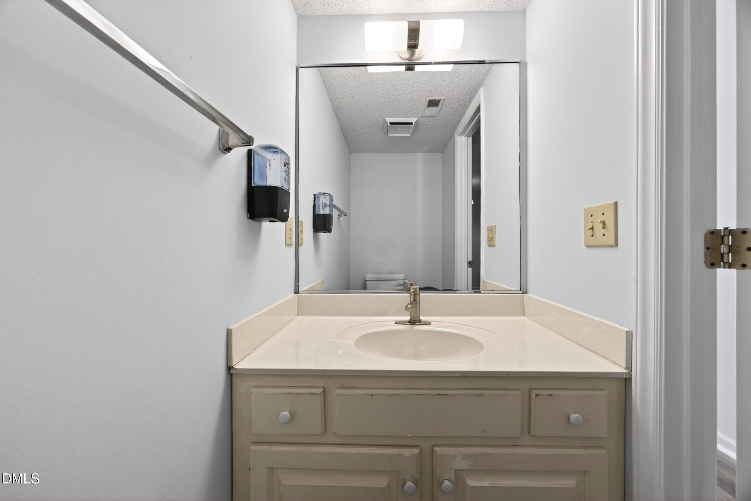 1901 Whites Mill Road High Point, NC 27265 - Photo 12 of 24 a bathroom with a sink and a mirror