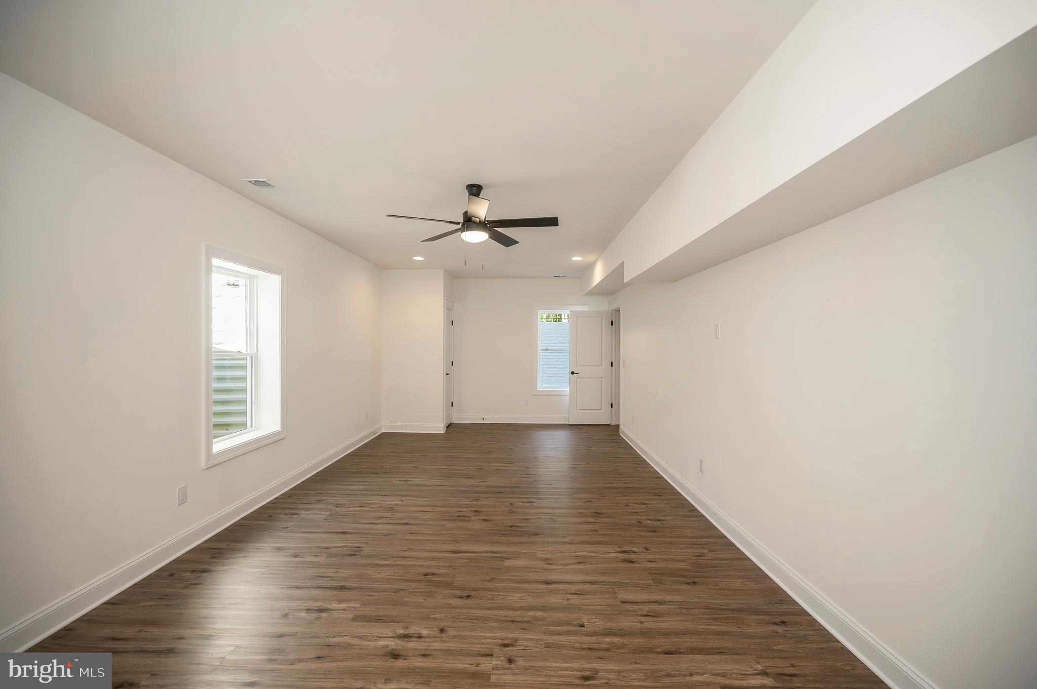 13208 Bristow Road Nokesville, VA 20181 - Photo 58 of 58 Lower level bedroom with LVP flooring