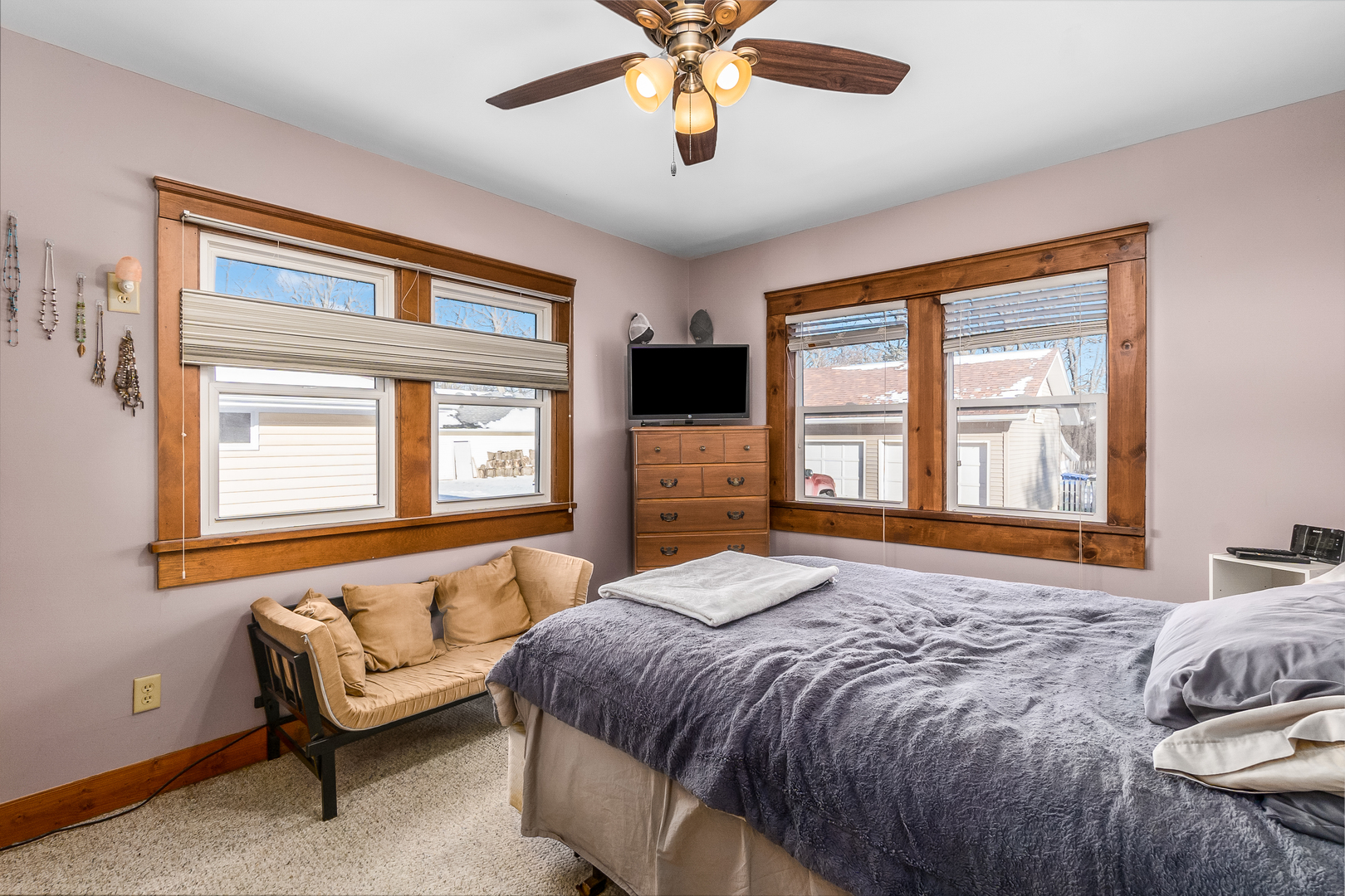 28W418 Batavia Road Warrenville, IL 60555 - Photo 12 of 24 a bedroom with a bed and a couch