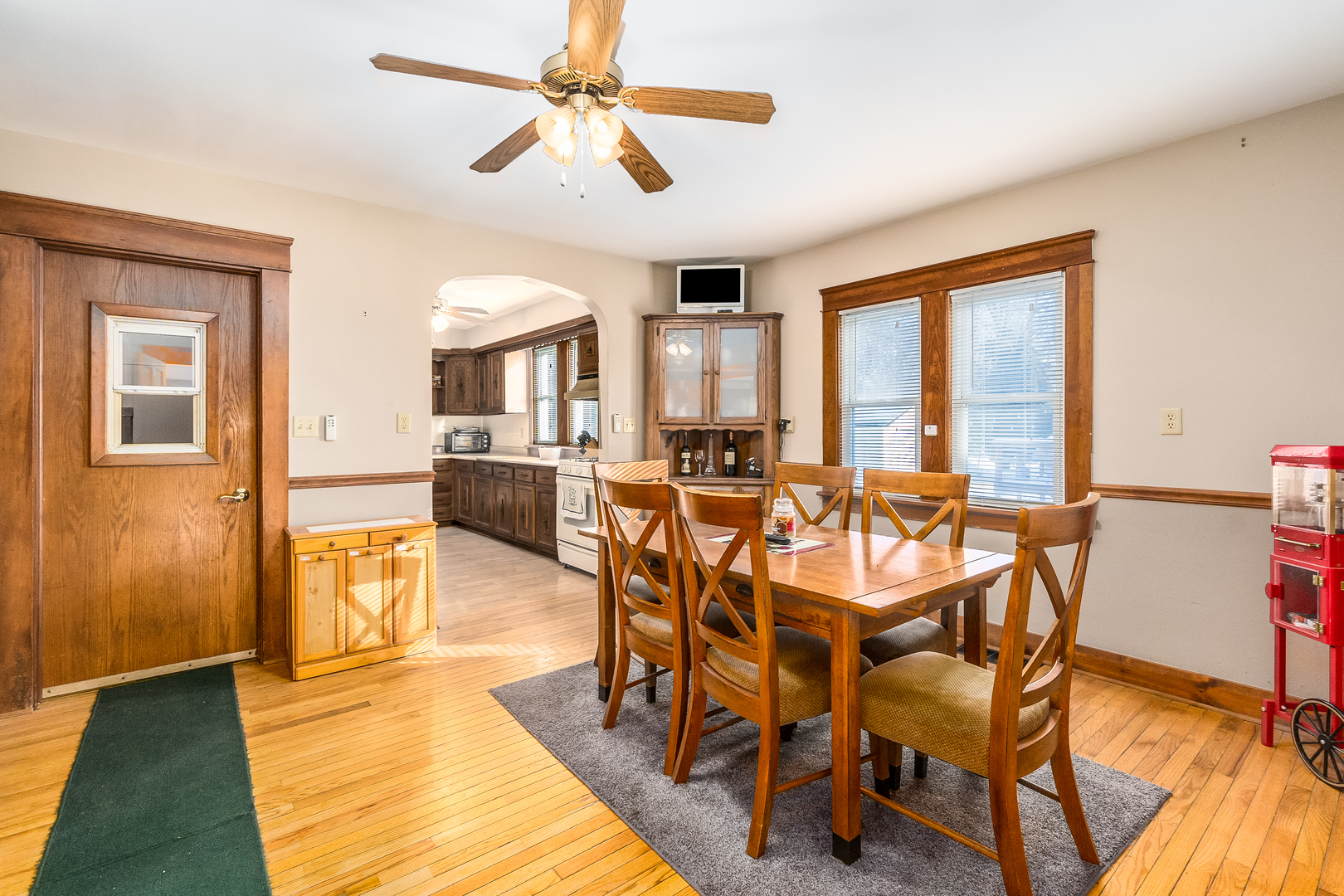28W418 Batavia Road Warrenville, IL 60555 - Photo 5 of 24 a view of a dining room with furniture window and wooden floor