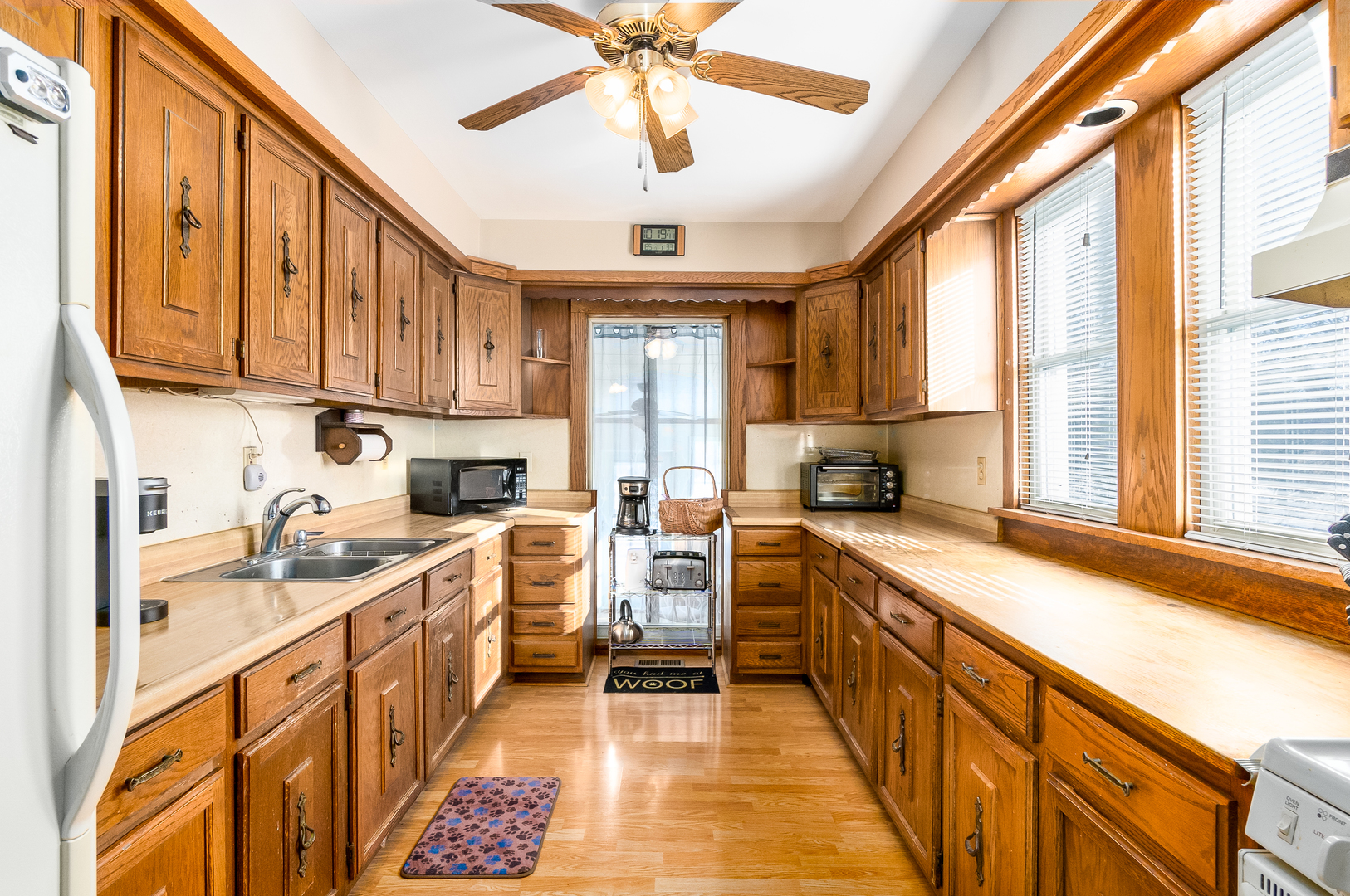 28W418 Batavia Road Warrenville, IL 60555 - Photo 6 of 24 a kitchen with stainless steel appliances granite countertop a sink a stove and cabinets