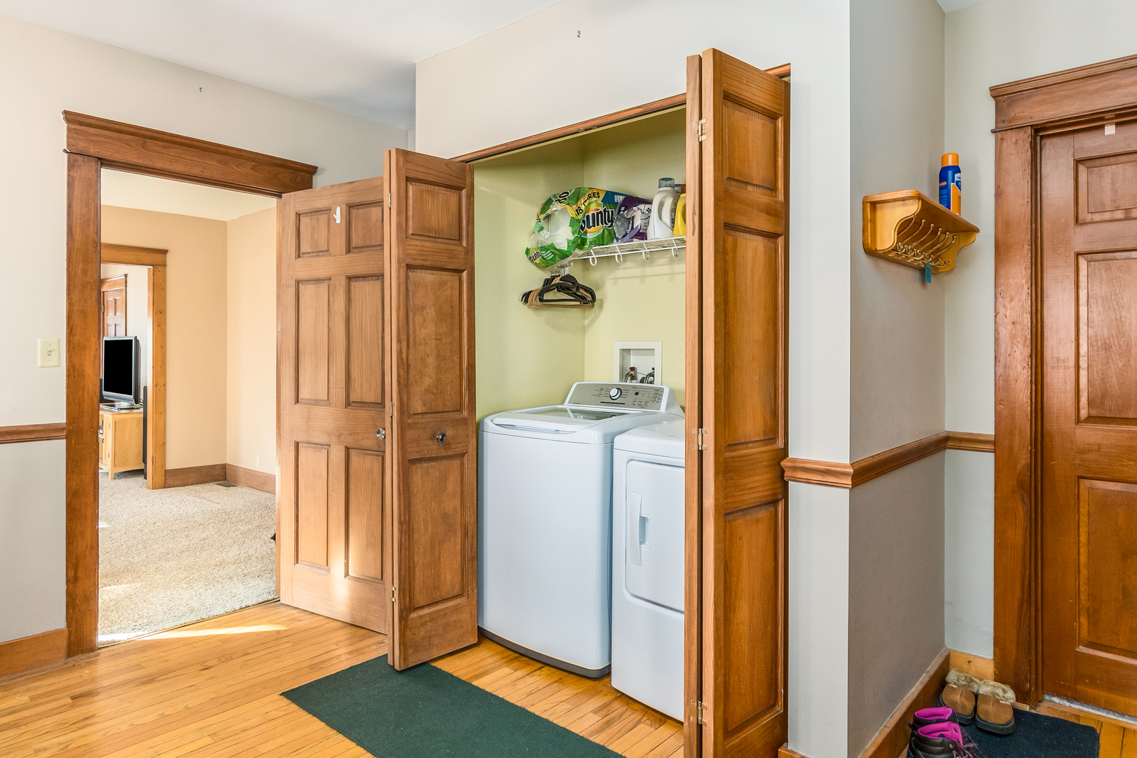28W418 Batavia Road Warrenville, IL 60555 - Photo 7 of 24 a view of a hallway with a door and couch