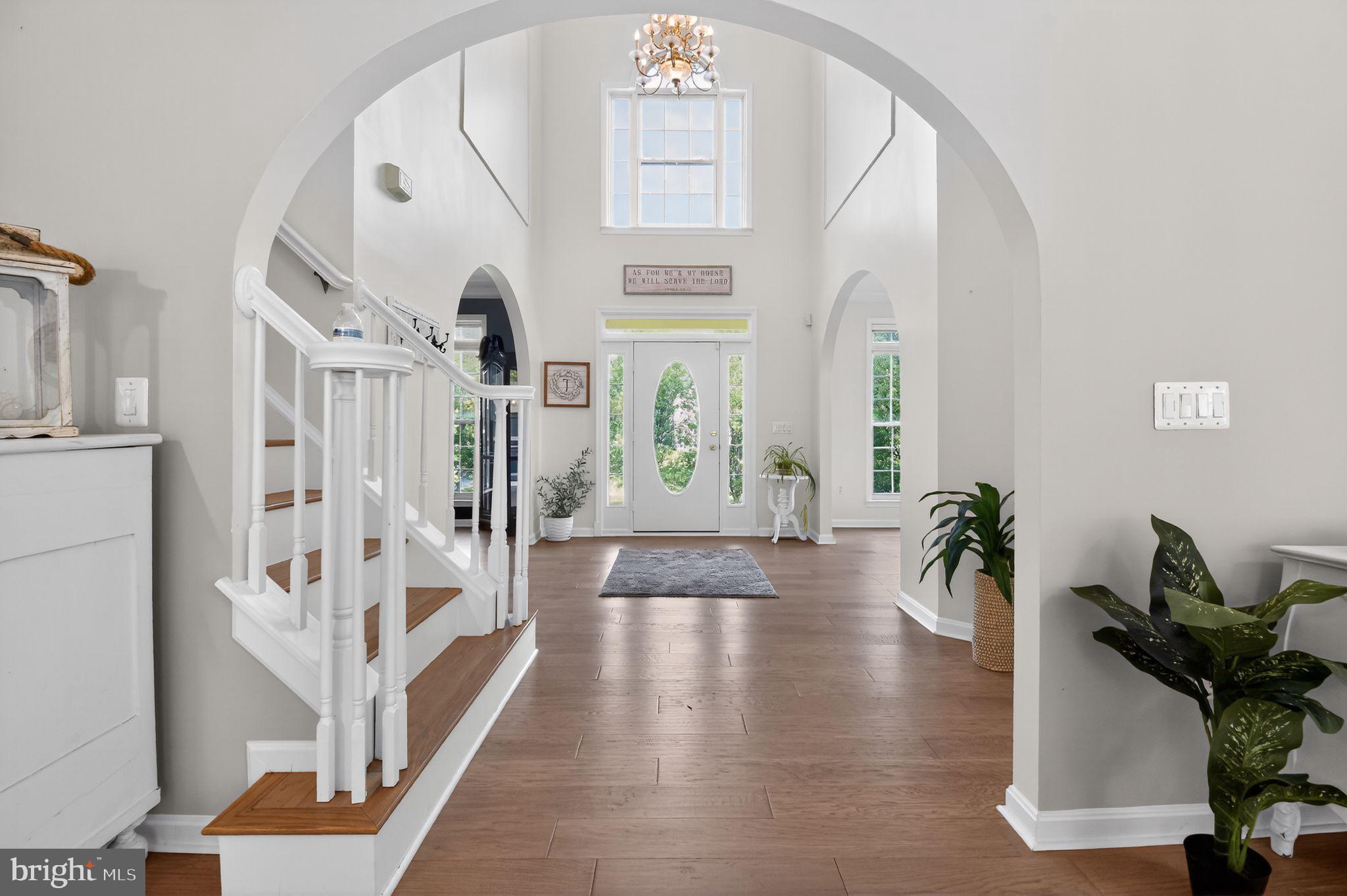 90 Oxford Way Huntingtown, MD 20639 - Photo 9 of 32 a view of an entryway with wooden floor