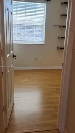 a outdoor space with lots of swings and slides