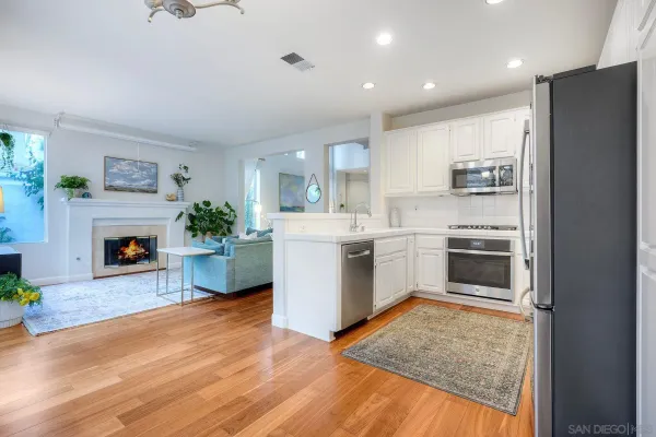 a kitchen with a cabinets and a stove